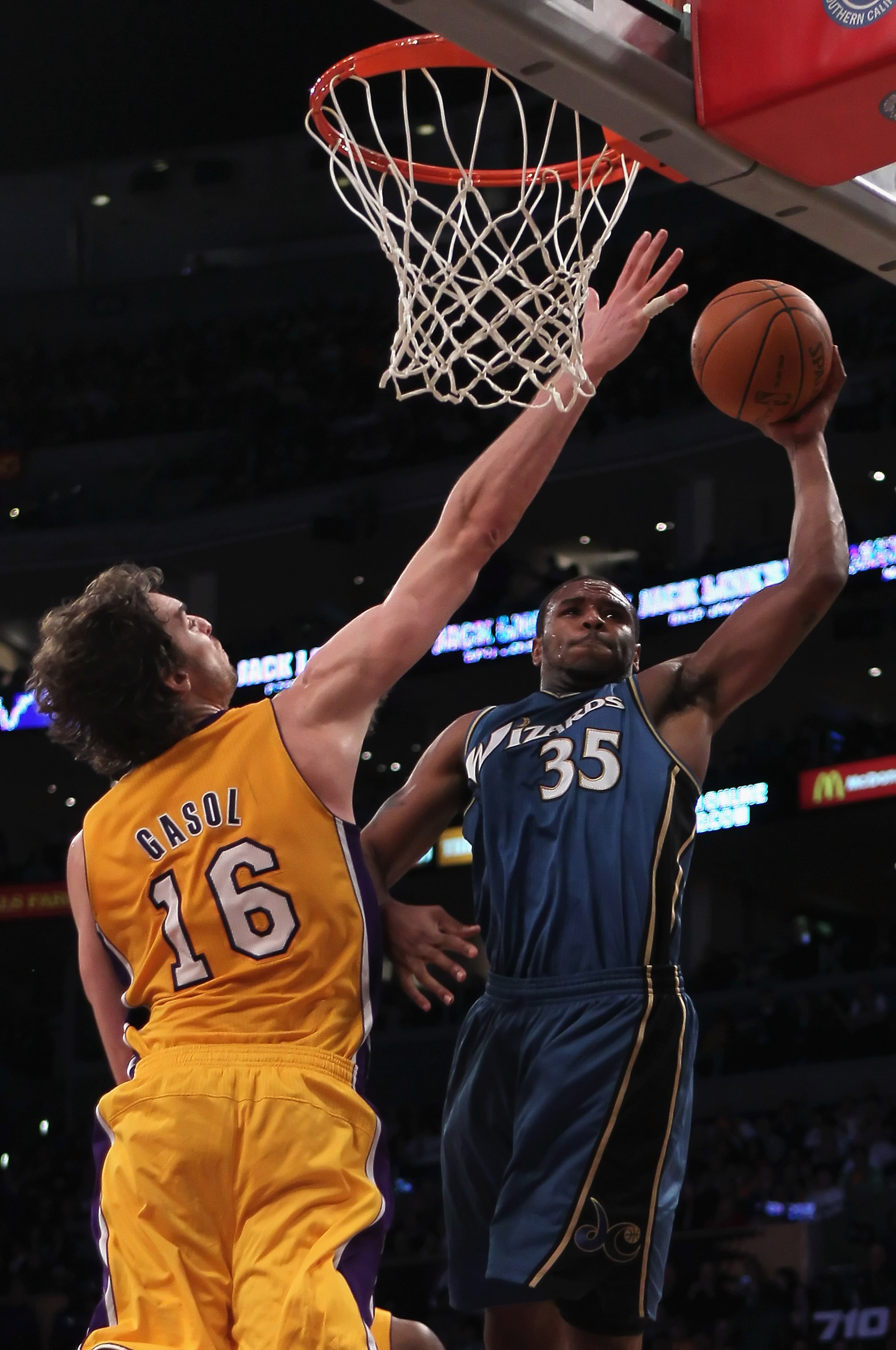 LOS ANGELES, CA - DECEMBER 07: Trevor Booker #35 of the Washington Wizards drives to the basket while being defended by Pau Gasol #16 of the Los Angeles Lakers in the second half at Staples Center on December 7, 2010 in Los Angeles, California. The Laker LOS ANGELES, CA - DECEMBER 07: Trevor Booker #35 of the Washington Wizards drives to the basket while being defended by Pau Gasol #16 of the Los Angeles Lakers in the second half at Staples Center on December 7, 2010 in Los Angeles, California. The Laker