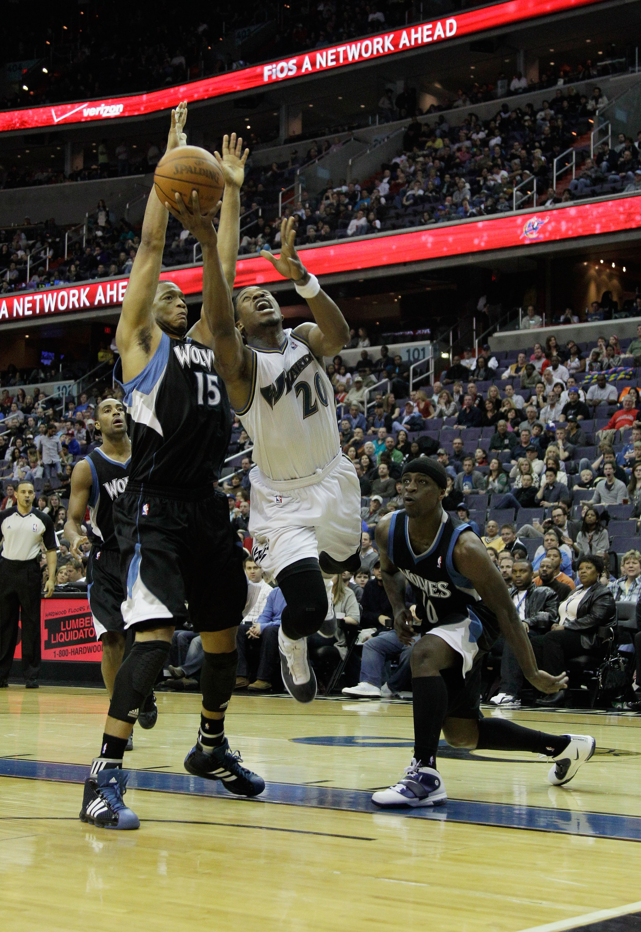 WASHINGTON, DC - MARCH 05: Cartier Martin #20 of the Washington Wizards puts up a shot in front of Anthony Randolph #15 of the Minnesota Timberwolves at the Verizon Center on March 5, 2011 in Washington, DC. NOTE TO USER: User expressly acknowledges and WASHINGTON, DC - MARCH 05: Cartier Martin #20 of the Washington Wizards puts up a shot in front of Anthony Randolph #15 of the Minnesota Timberwolves at the Verizon Center on March 5, 2011 in Washington, DC. NOTE TO USER: User expressly acknowledges and