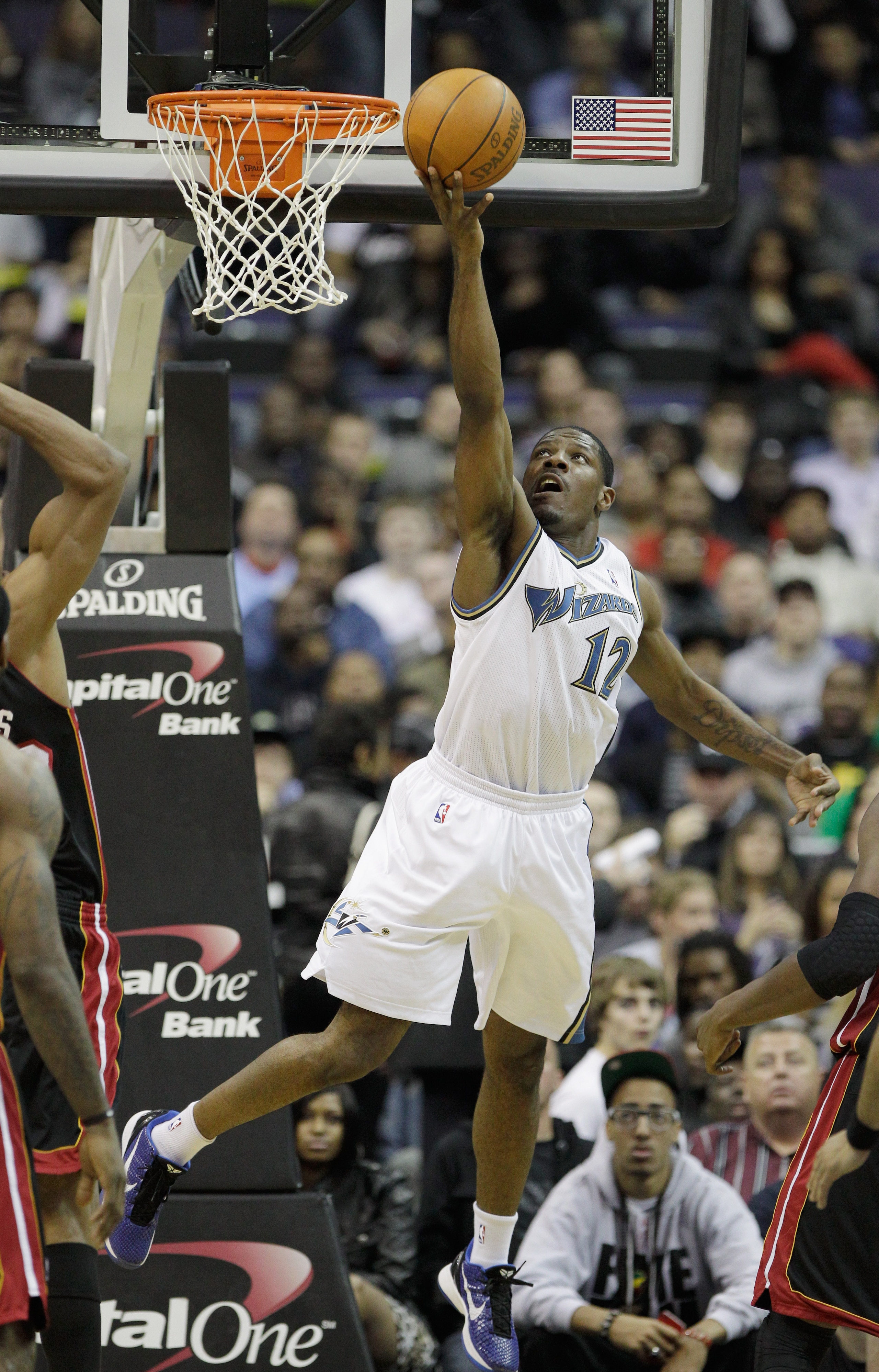 WASHINGTON, DC - MARCH 30: Othyus Jeffers #12 of the Washington Wizards puts up a shot against the Miami Heat at the Verizon Center on March 30, 2011 in Washington, DC. NOTE TO USER: User expressly acknowledges and agrees that, by downloading and/or using WASHINGTON, DC - MARCH 30: Othyus Jeffers #12 of the Washington Wizards puts up a shot against the Miami Heat at the Verizon Center on March 30, 2011 in Washington, DC. NOTE TO USER: User expressly acknowledges and agrees that, by downloading and/or using