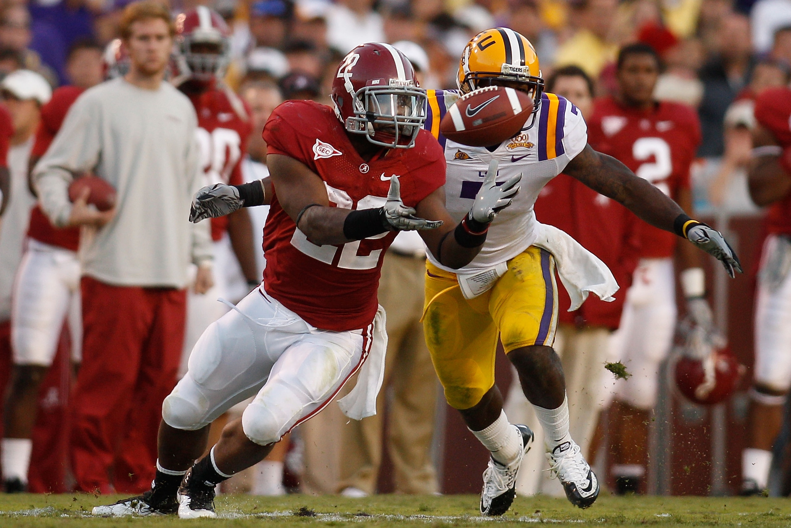 BATON ROUGE, LA - NOVEMBER 06:  Mark Ingram #22 of the Alabama Crimson Tide tries to catch the ball near Patrick Peterson #7 of the Louisiana State University Tigers at Tiger Stadium on November 6, 2010 in Baton Rouge, Louisiana.  The Tigers defeated the
