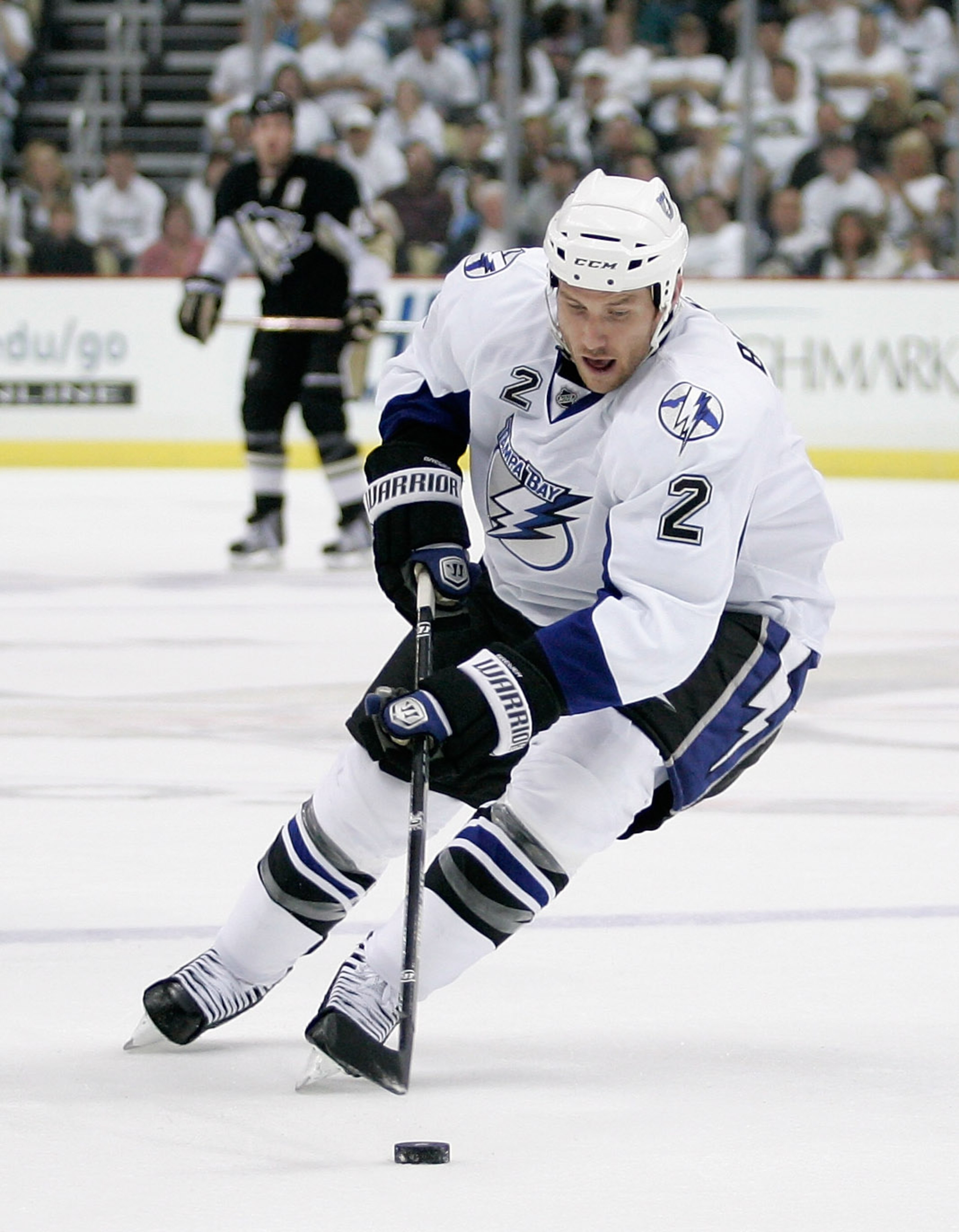PITTSBURGH, PA - APRIL 15:  Eric Brewer#2 of the Tampa Bay Lightning controls the puck during Game Two of the Eastern Conference Quarterfinals against the  Pittsburgh Penguins during the 2011 NHL Stanley Cup Playoffs at Consol Energy Center on April 15, 2