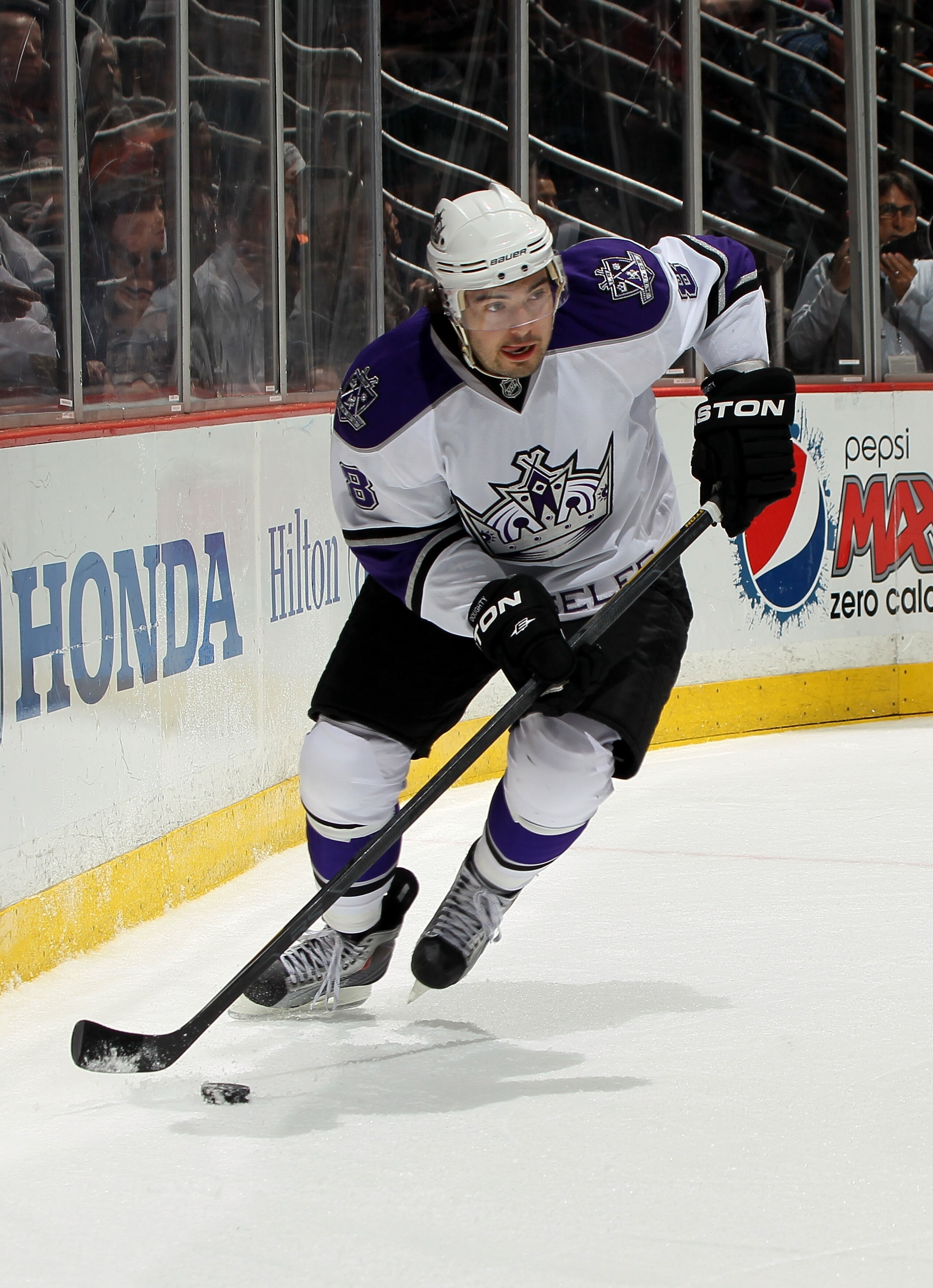 ANAHEIM, CA - APRIL 8: Drew Doughty #8 of the Los Angeles Kings skates with the puck against the Anaheim Ducks at Honda Center on April 8, 2011 in Anaheim, California. (Photo by Stephen Dunn/Getty Images) ANAHEIM, CA - APRIL 8: Drew Doughty #8 of the Los Angeles Kings skates with the puck against the Anaheim Ducks at Honda Center on April 8, 2011 in Anaheim, California. (Photo by Stephen Dunn/Getty Images)
