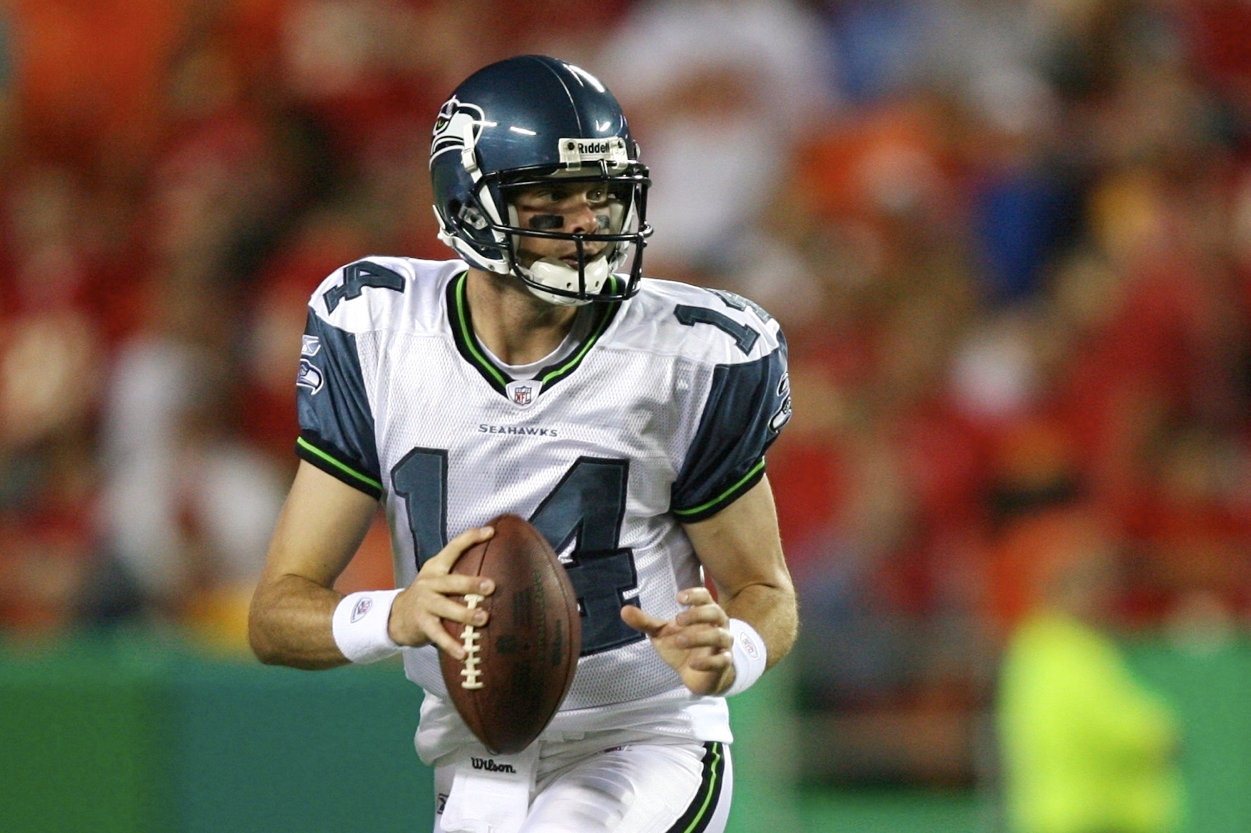 KANSAS CITY, MO - AUGUST 29: Quarterback Mike Teel #14 of the Seattle Seahawks looks to pass against the Kansas City Chiefs during their preseason game at Arrowhead Stadium on August 29, 2009 in Kansas City, Missouri. (Photo by Dilip Vishwanat/Getty Image KANSAS CITY, MO - AUGUST 29: Quarterback Mike Teel #14 of the Seattle Seahawks looks to pass against the Kansas City Chiefs during their preseason game at Arrowhead Stadium on August 29, 2009 in Kansas City, Missouri. (Photo by Dilip Vishwanat/Getty Image