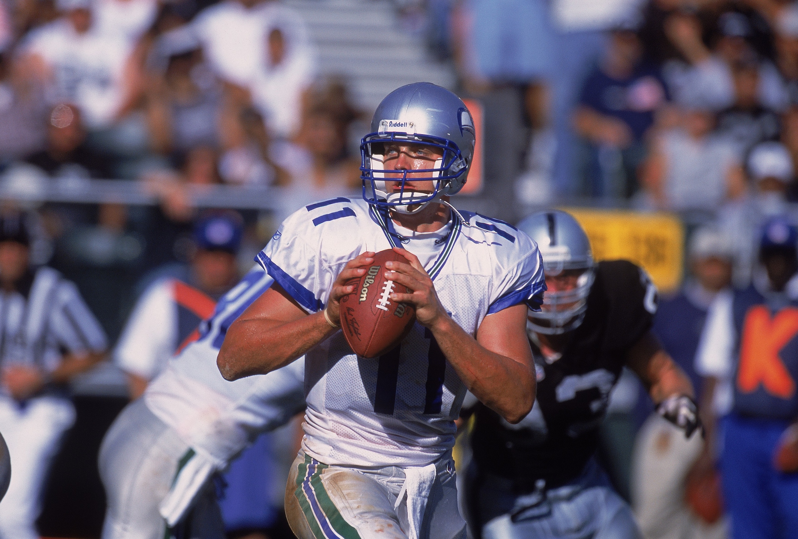 30 Sep 2001: #Brock Huard #11 of the Seattle Seahawks looks for a teammate to pass to during the game against the Oakland Raiders at the Network Associates Coliseum in Oakland, California. The Raiders defeated the Seahawks 38-14.Mandatory Credit: Tom Ha 30 Sep 2001: #Brock Huard #11 of the Seattle Seahawks looks for a teammate to pass to during the game against the Oakland Raiders at the Network Associates Coliseum in Oakland, California. The Raiders defeated the Seahawks 38-14.Mandatory Credit: Tom Ha