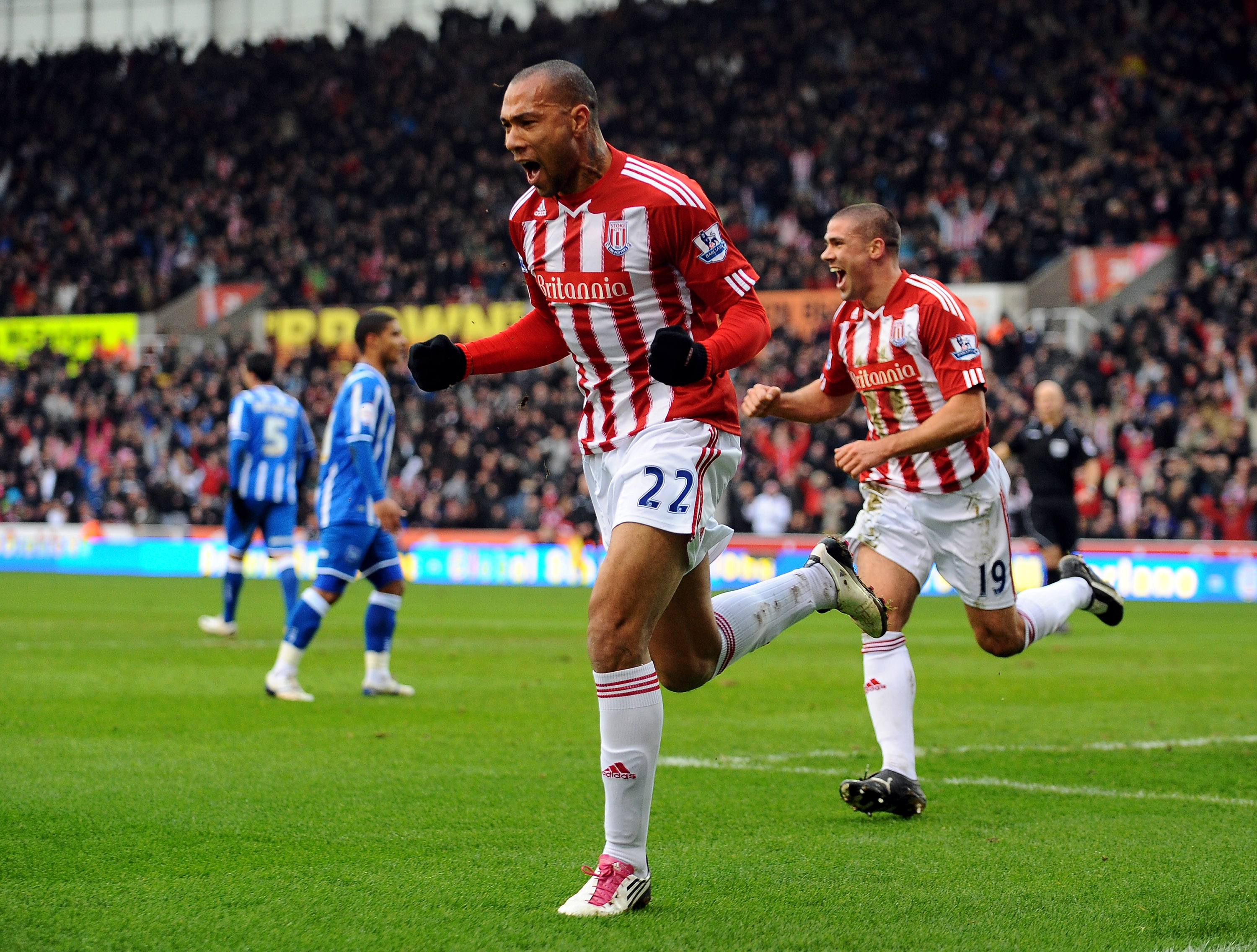 STOKE ON TRENT, ENGLAND - FEBRUARY 19:  John Carew (L) of Stoke celebrates with teammate Jonathan Walters after scoring the opening goal during the FA Cup sponsored by E.ON 5th Round match between Stoke City and Brighton & Hove Albion at Britannia Stadium