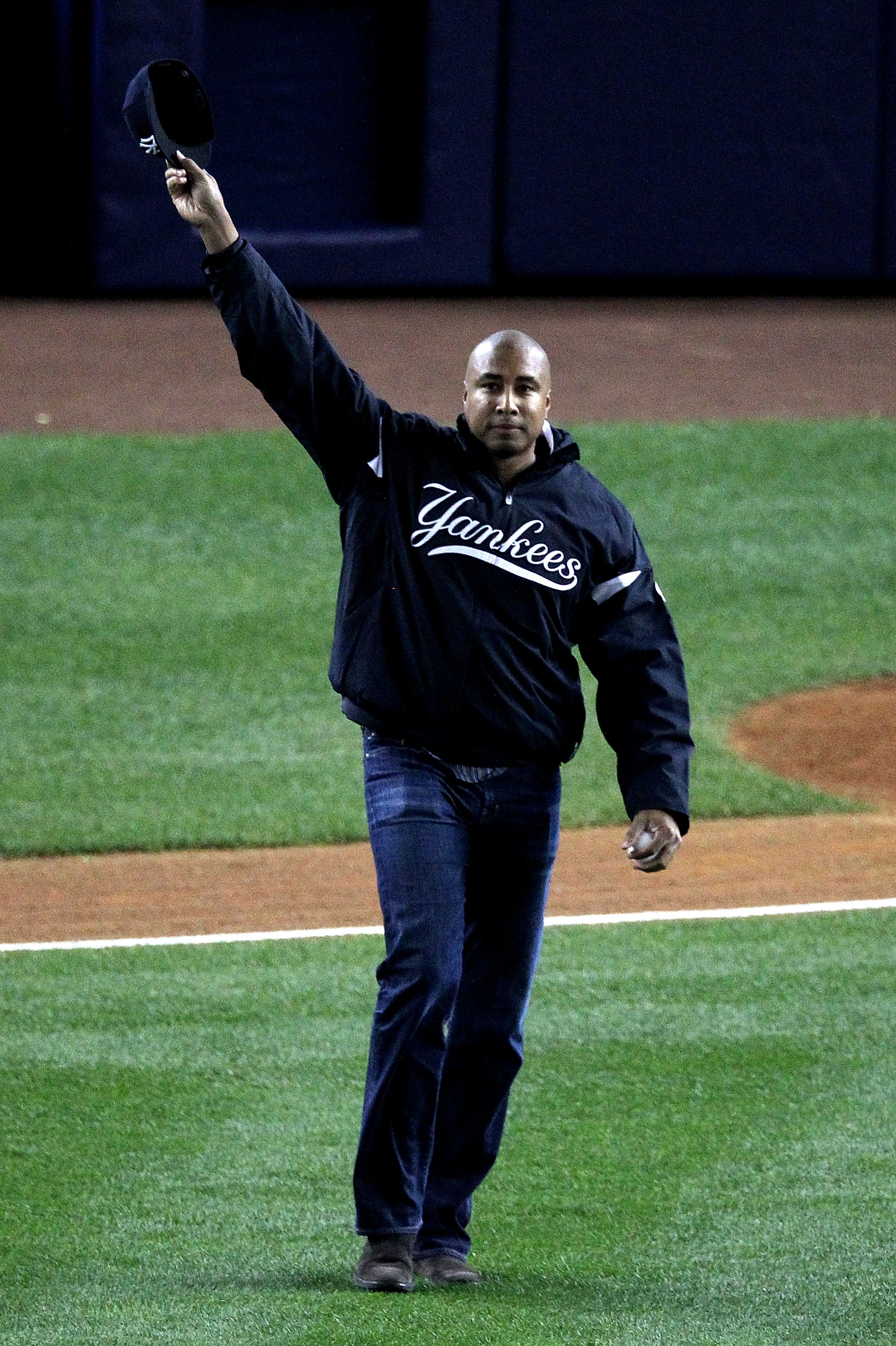 NEW YORK - OCTOBER 19:  Former New York Yankee Bernie Williams waves before throwing out the first pitch prior to Game Four of the ALCS during the 2010 MLB Playoffs at Yankee Stadium on October 19, 2010 in the Bronx borough of New York City.  (Photo by Al