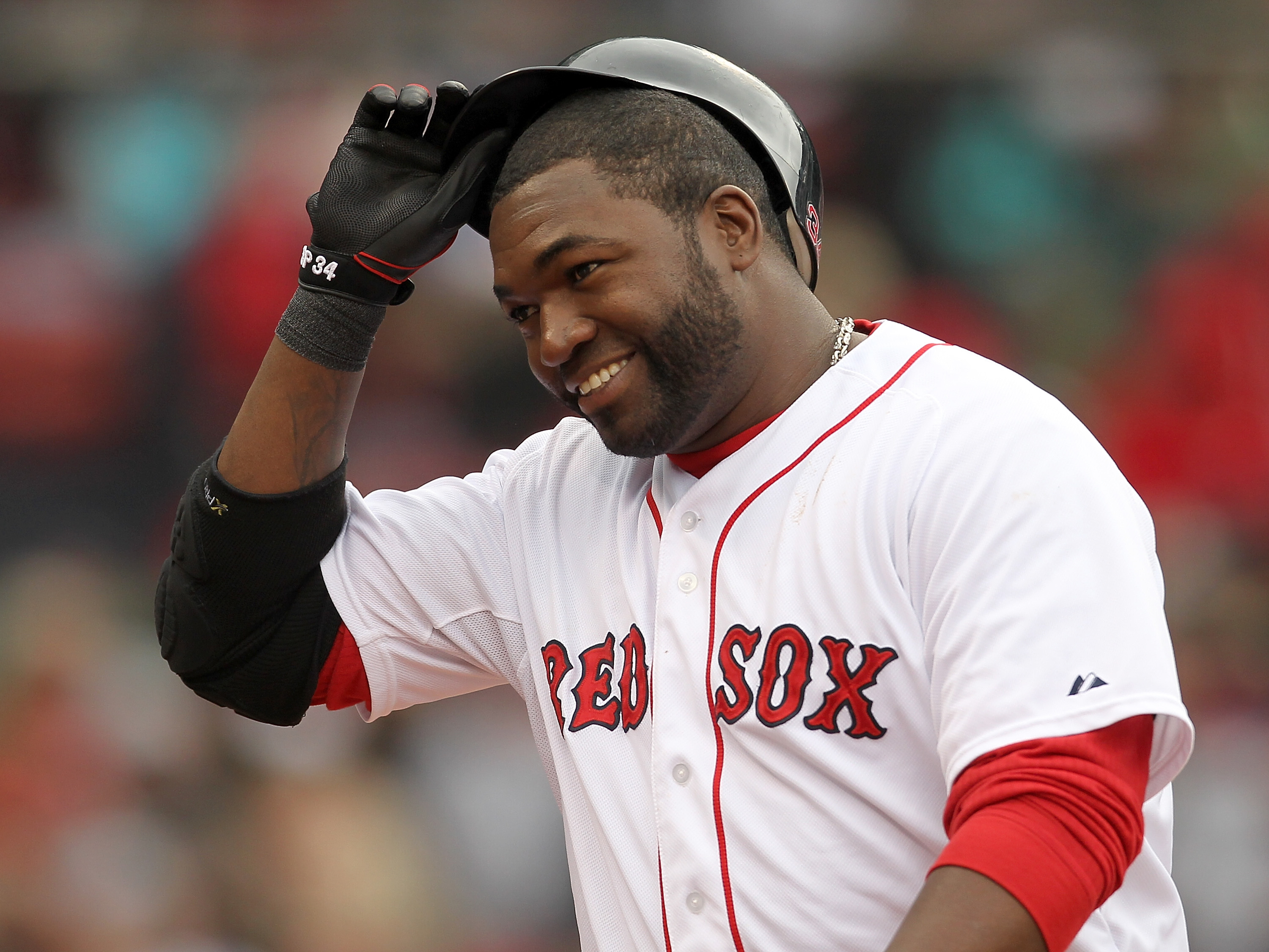 BOSTON, MA - APRIL 16, 2011:  David Ortiz #34 of the Boston Red Sox reacts in the seventh inning against the Toronto Blue Jays at Fenway Park April 16, 2011 in Boston, Massachusetts. (Photo by Jim Rogash/Getty Images)
