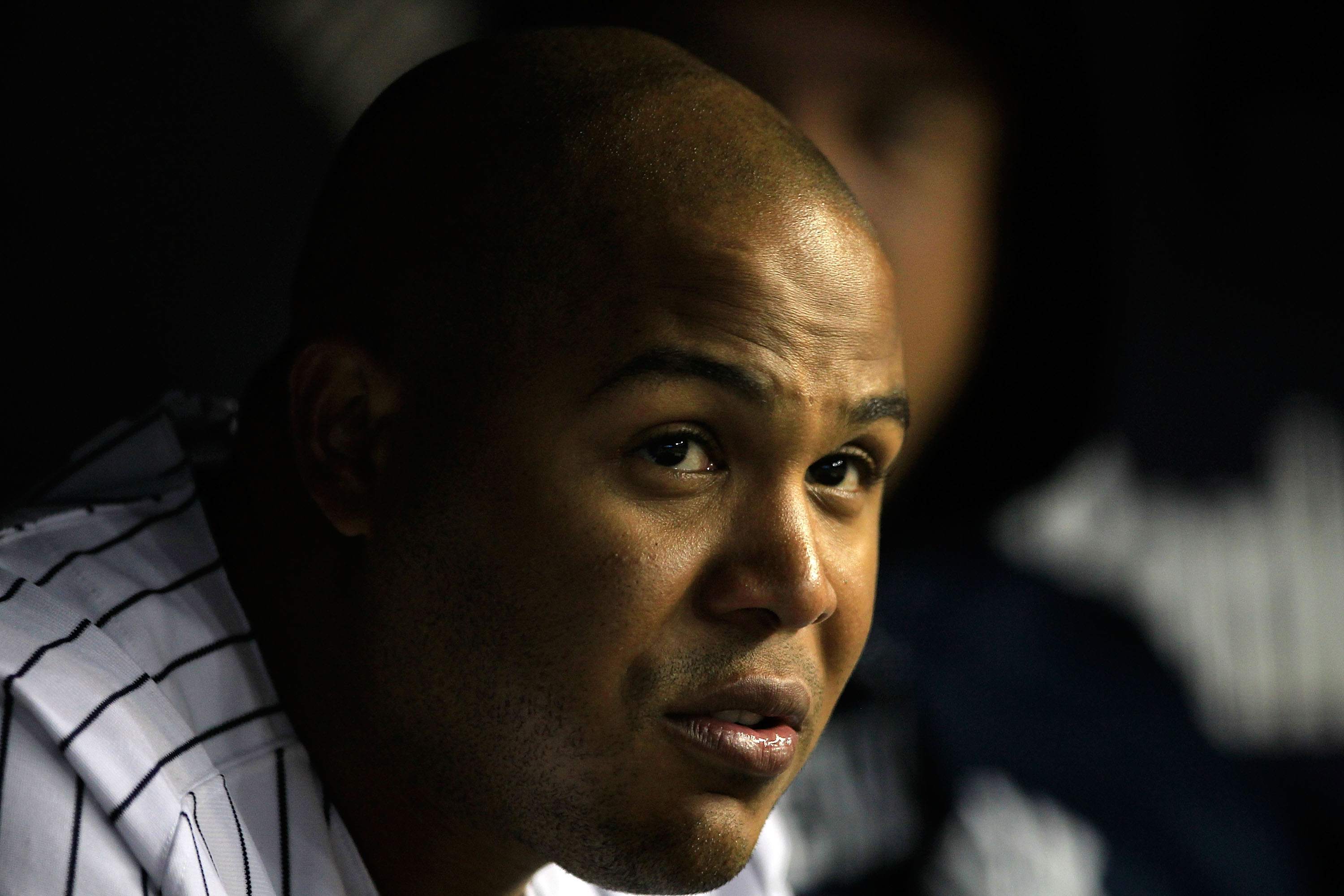 NEW YORK, NY - APRIL 15: Andruw Jones of the New York Yankees looks on from the dugout during the game against the Texas Rangers at Yankee Stadium on April 15, 2011 in the Bronx borough of New York City.  (Photo by Chris Trotman/Getty Images)