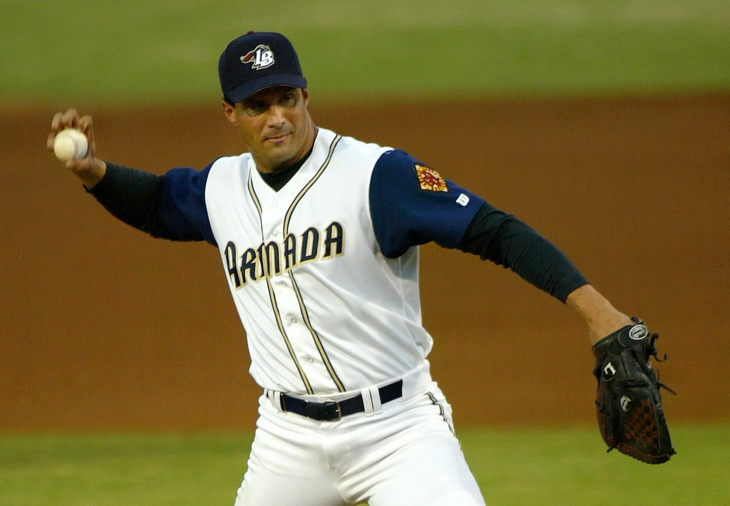 LONG BEACH, CA - AUGUST 16:  Jose Canseco #33 of the Long Beach Armada pitches against the Reno Silver Sox during the second inning of the Golden Baseball League game on August 16, 2006 at Blair Field in Long Beach, California.  (Photo by Christian Peters