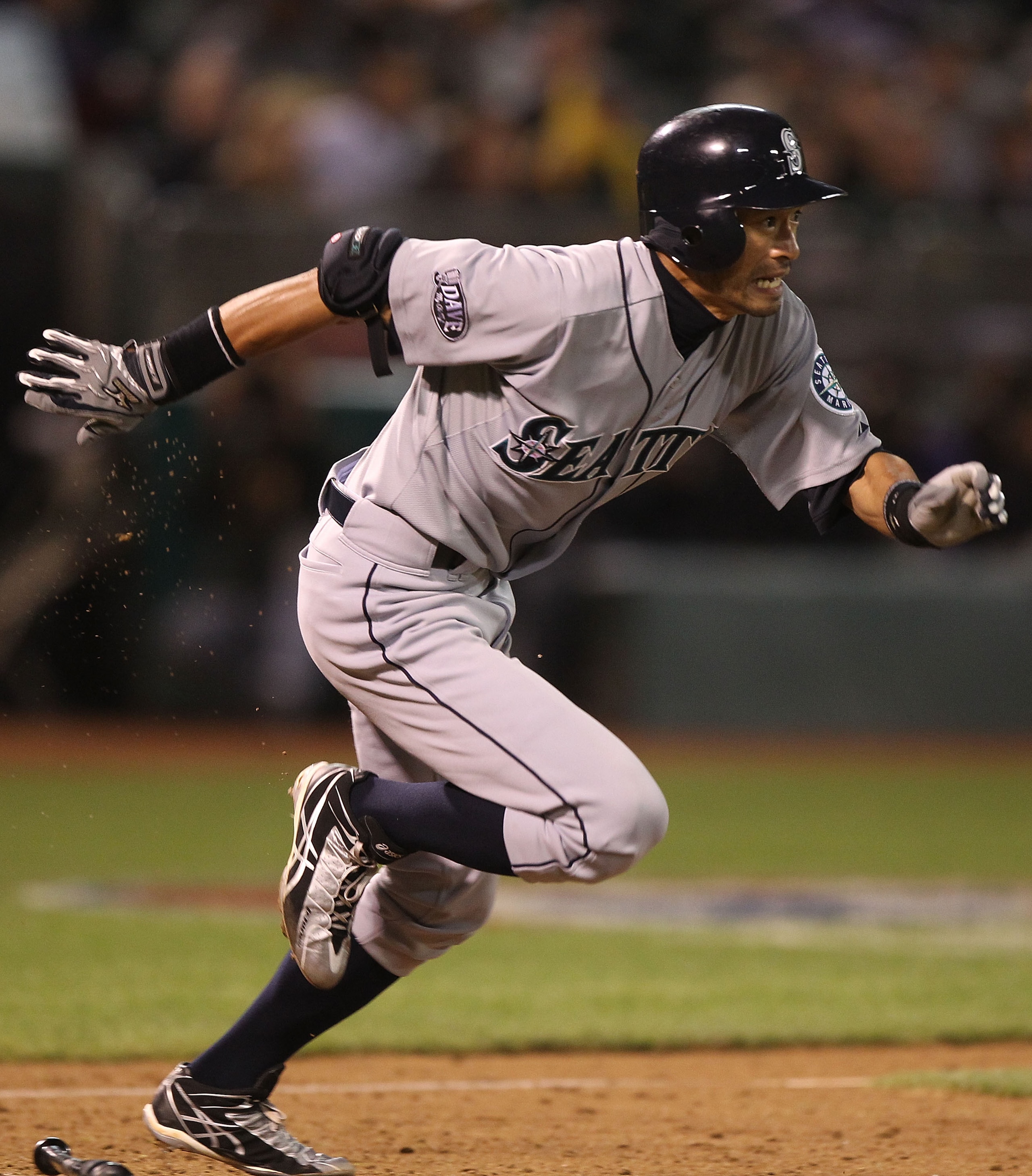 OAKLAND, CA - APRIL 02:  Ichiro Suzuki #51 of the Seattle Mariners hits a fielder's choice in the ninth inning against the Oakland Athletics during a Major League Baseball game at the Oakland-Alameda County Coliseum on April 2, 2011 in Oakland, California