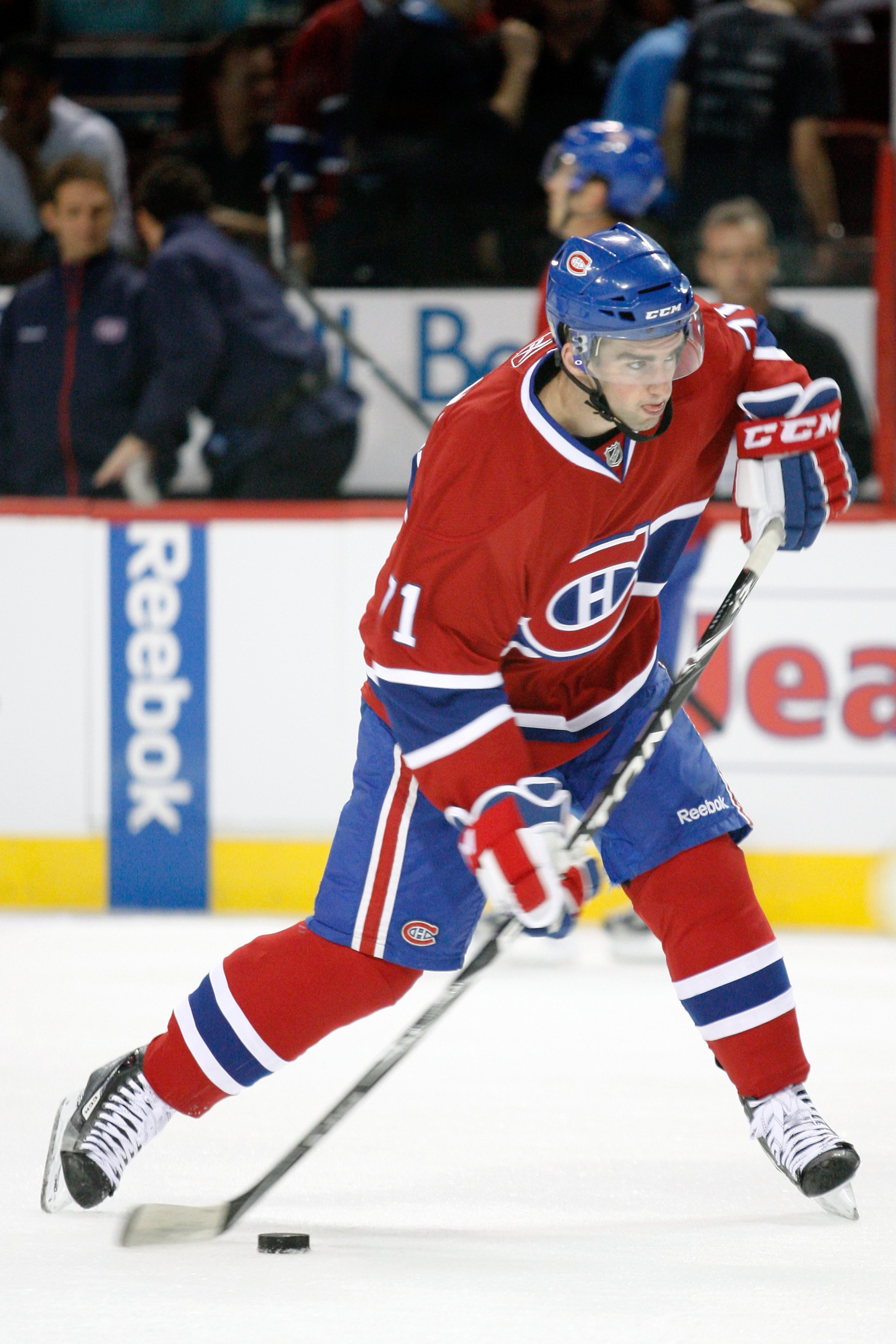 MONTREAL- SEPTEMBER 22:  Louis Leblanc #71 of the Montreal Canadiens shoots the puck during the warm up period prior to facing the Boston Bruins in an NHL pre-season game at the Bell Centre on September 22, 2010 in Montreal, Quebec, Canada.  The Bruins de