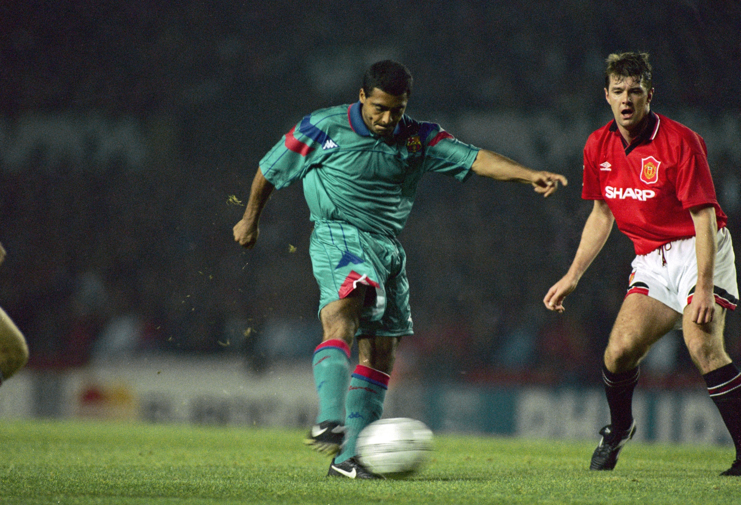 Brazilian striker Rom?rio de Souza Faria, known as Romario, playing for Spanish club FC Barcelona in a Champions League group stage match against Manchester United at Old Trafford, October 1994. (Photo by Chris Cole/Getty Images) Brazilian striker Rom?rio de Souza Faria, known as Romario, playing for Spanish club FC Barcelona in a Champions League group stage match against Manchester United at Old Trafford, October 1994. (Photo by Chris Cole/Getty Images)