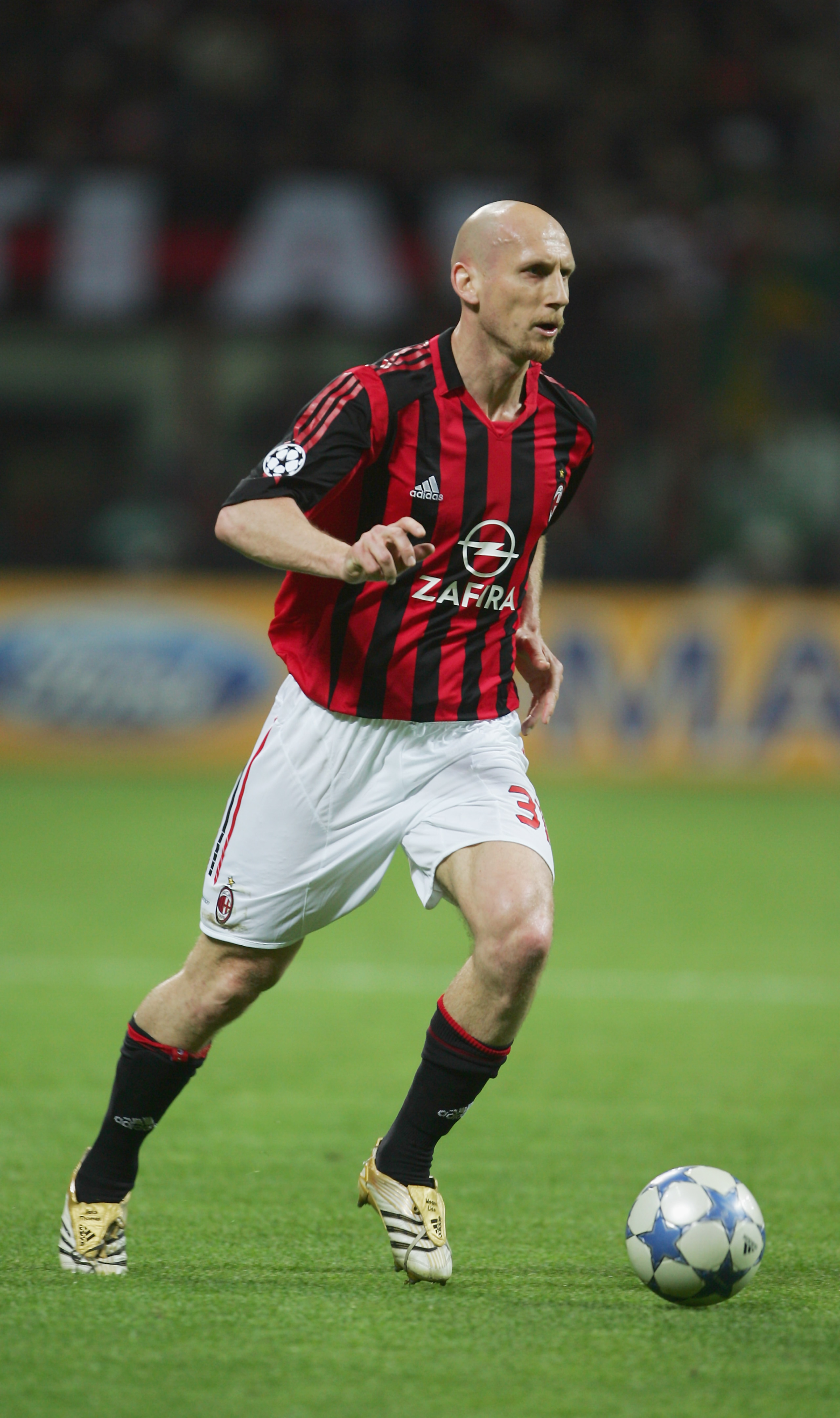 MILAN, ITALY - APRIL 18: Jaap Stam of Milan in action during the UEFA Champions League Semi Final between AC Milan and Barcelona at the San Siro stadium on April 18, 2006 in Milan, Italy. (Photo by Mike Hewitt/Getty Images) MILAN, ITALY - APRIL 18: Jaap Stam of Milan in action during the UEFA Champions League Semi Final between AC Milan and Barcelona at the San Siro stadium on April 18, 2006 in Milan, Italy. (Photo by Mike Hewitt/Getty Images)
