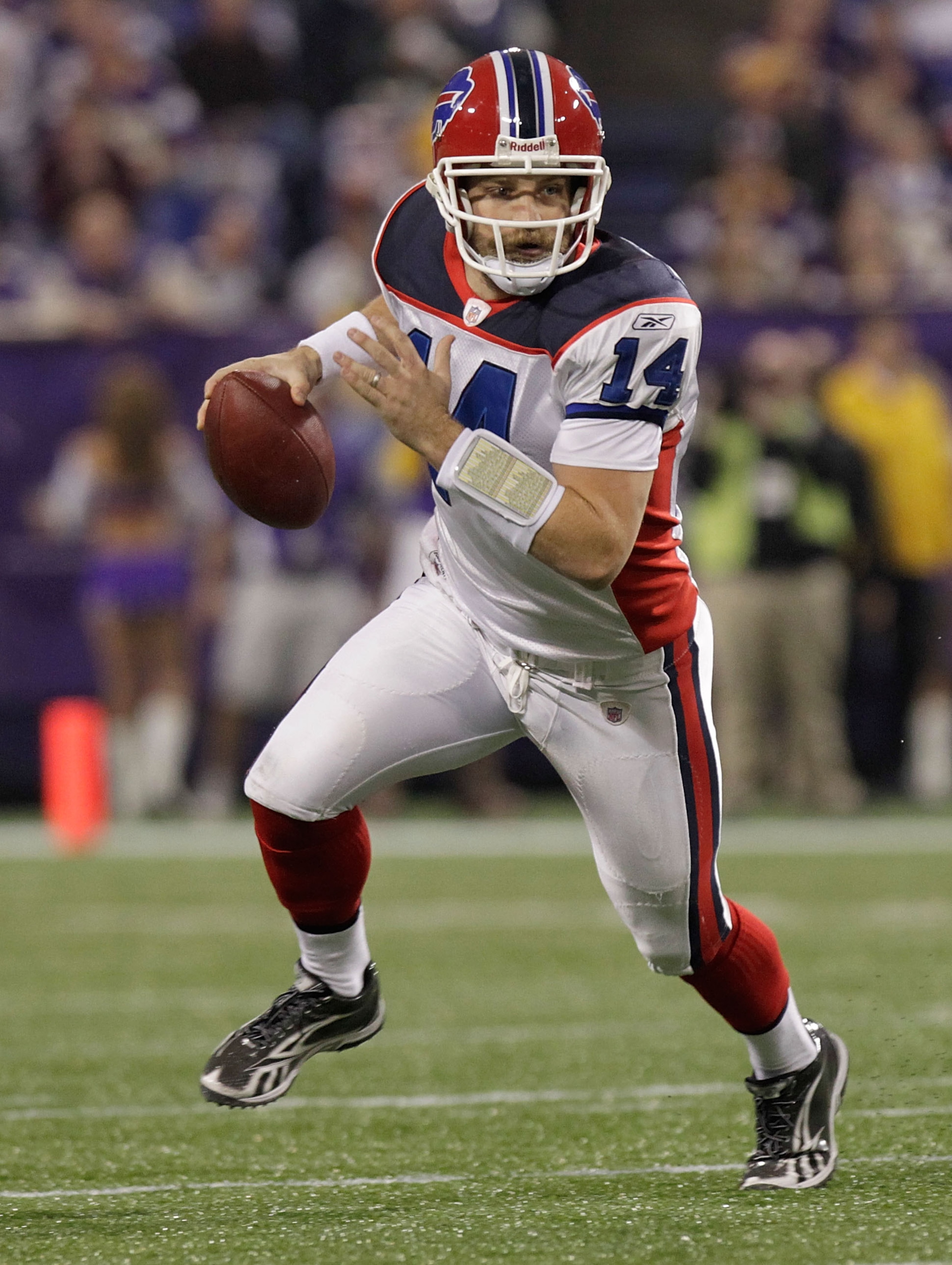 MINNEAPOLIS, MN - DECEMBER 05:  Ryan Fitzpatrick #14 of the Buffalo Bills rolls out against the Minnesota Vikings at the Mall of America Field at the Hubert H. Humphrey Metrodome on December 5, 2010 in Minneapolis, Minnesota.  (Photo by Nick Laham/Getty I