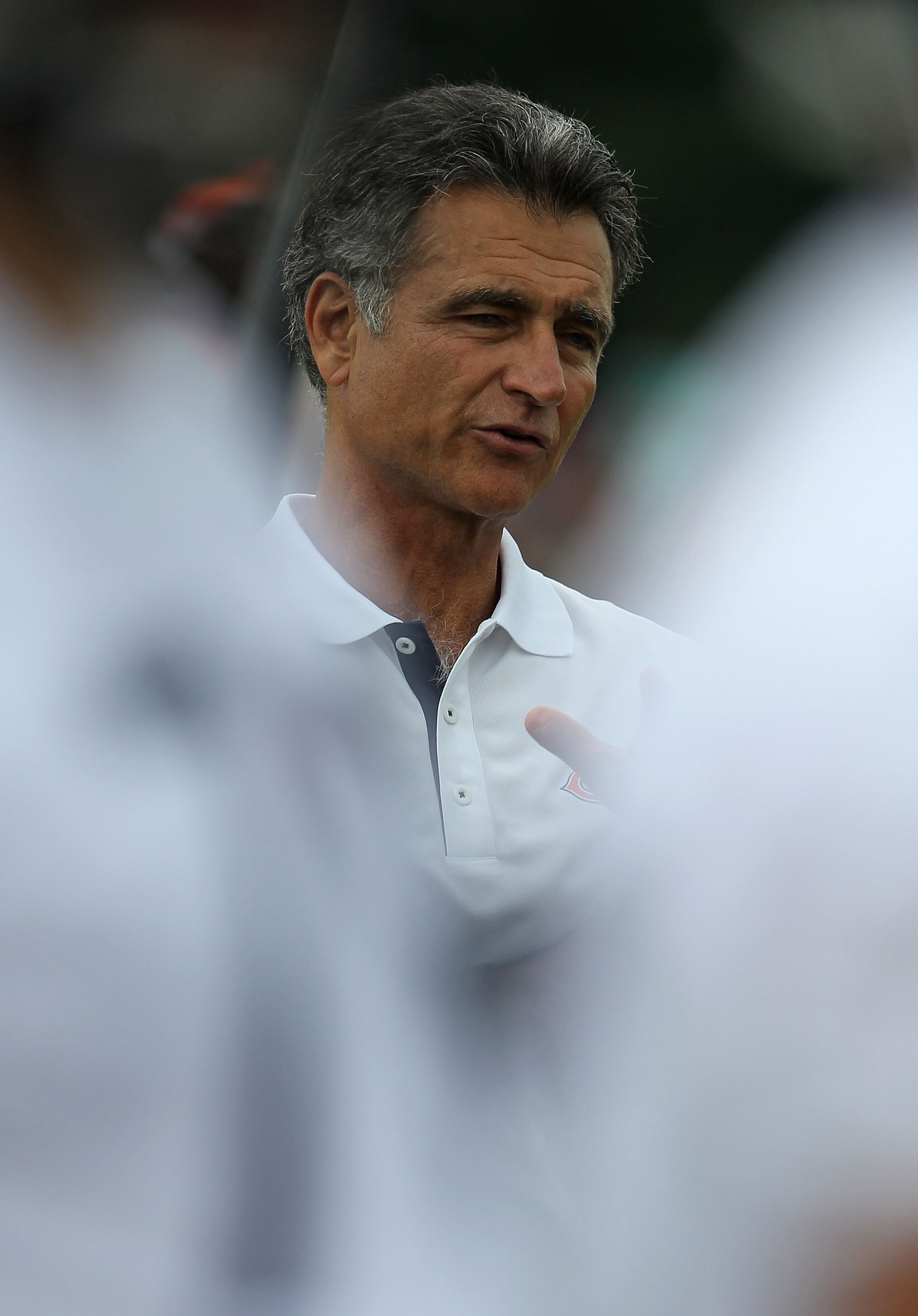 BOURBONNAIS, IL - JULY 30: General manager Jerry Angelo of the Chicago Bears watches a summer training camp practice at Olivet Nazarene University on July 30, 2010 in Bourbonnais, Illinois. (Photo by Jonathan Daniel/Getty Images)