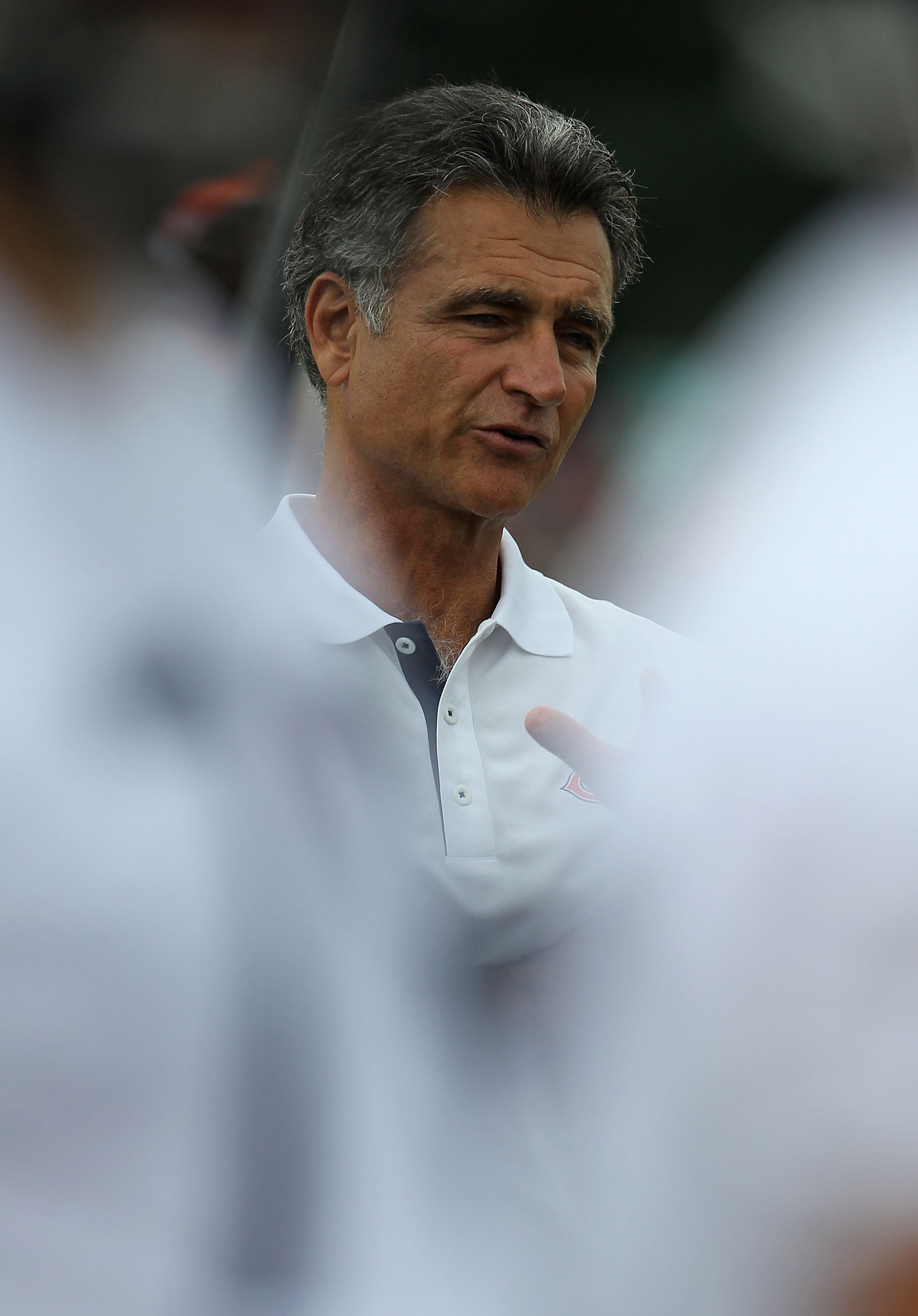 BOURBONNAIS, IL - JULY 30: General manager Jerry Angelo of the Chicago Bears watches a summer training camp practice at Olivet Nazarene University on July 30, 2010 in Bourbonnais, Illinois. (Photo by Jonathan Daniel/Getty Images) BOURBONNAIS, IL - JULY 30: General manager Jerry Angelo of the Chicago Bears watches a summer training camp practice at Olivet Nazarene University on July 30, 2010 in Bourbonnais, Illinois. (Photo by Jonathan Daniel/Getty Images)