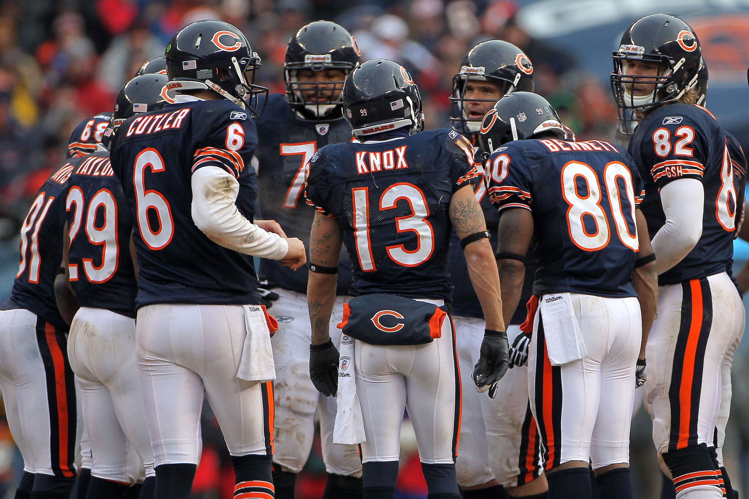 CHICAGO, IL - JANUARY 16:  Jay Cutler #6 of the Chicago Bears huddles with his team against the Seattle Seahawks in the 2011 NFC divisional playoff game at Soldier Field on January 16, 2011 in Chicago, Illinois.  (Photo by Doug Pensinger/Getty Images)