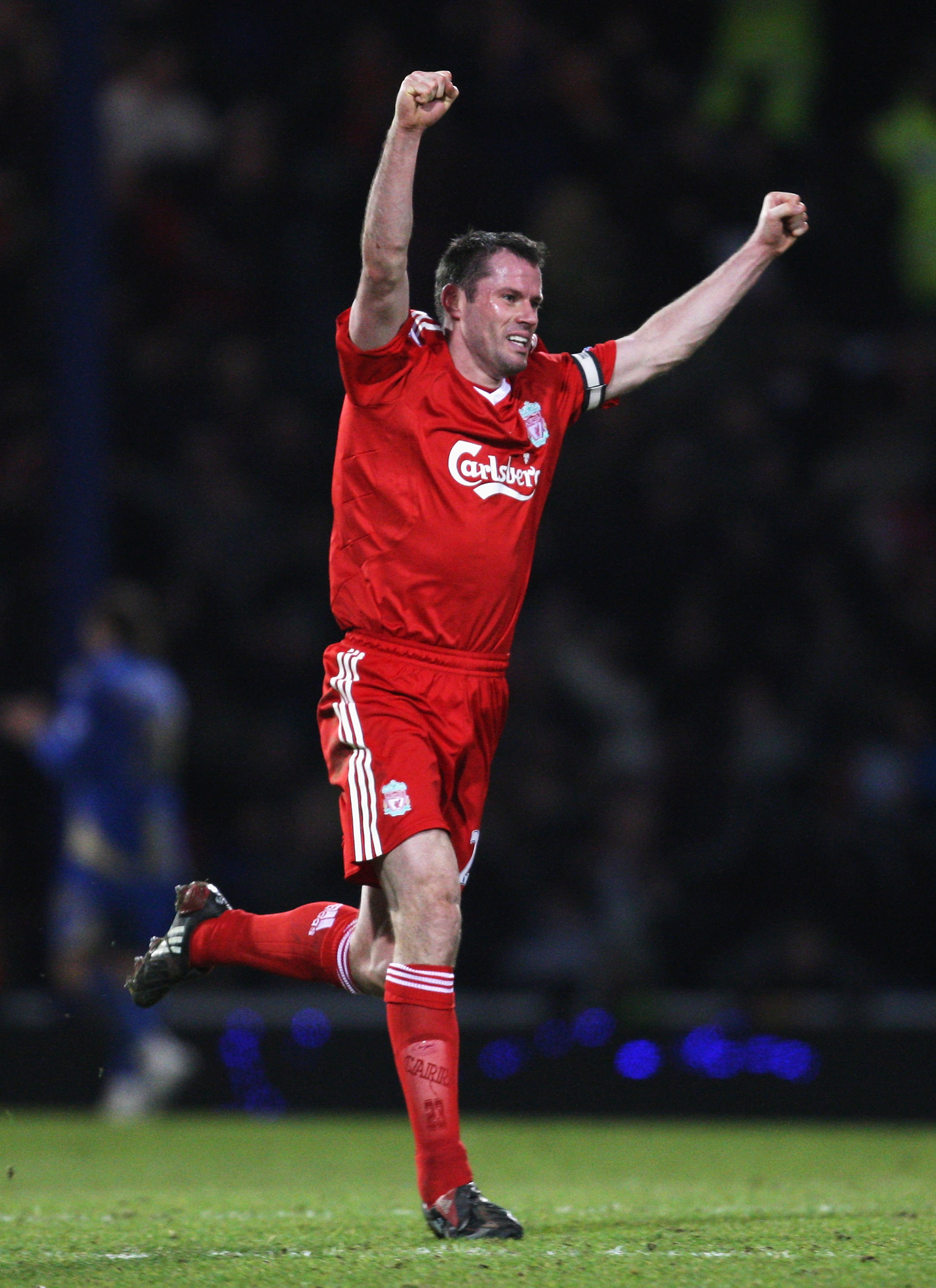 PORTSMOUTH, UNITED KINGDOM - FEBRUARY 07: Jamie Carragher of Liverpool celebrates Fernando Torres' winning goal during the Barclays Premier League match between Portsmouth and Liverpool at Fratton Park on February 7, 2009 in Portsmouth, England.  (Photo b