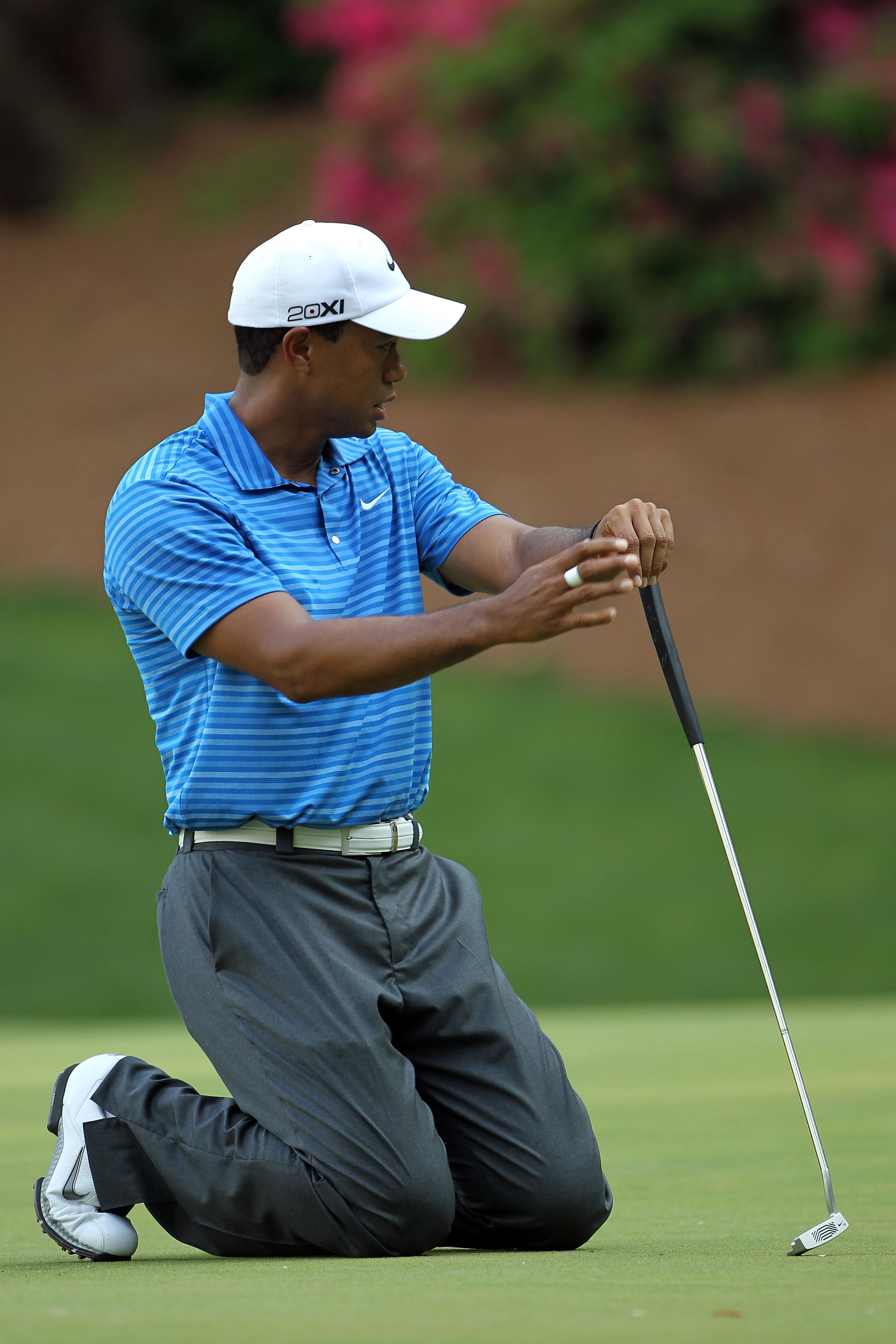 AUGUSTA, GA - APRIL 09:  Tiger Woods reacts to a missed putt on the 13th green during the third round of the 2011 Masters Tournament at Augusta National Golf Club on April 9, 2011 in Augusta, Georgia.  (Photo by Jamie Squire/Getty Images)