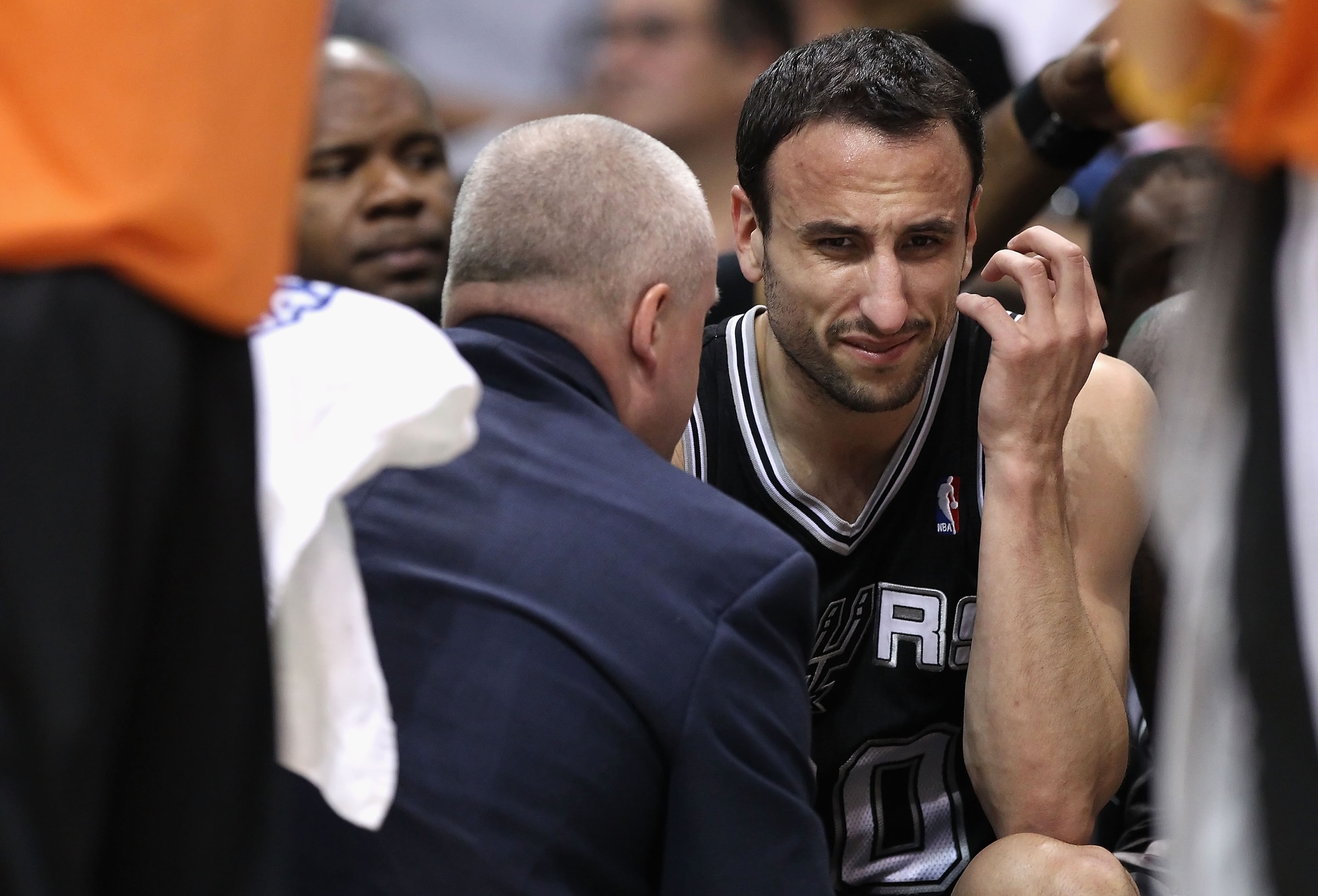 PHOENIX, AZ - APRIL 13:  Manu Ginobili #20 of the San Antonio Spurs reacts on the bench after an injury in the NBA game against the Phoenix Suns at US Airways Center on April 13, 2011 in Phoenix, Arizona.  NOTE TO USER: User expressly acknowledges and agr
