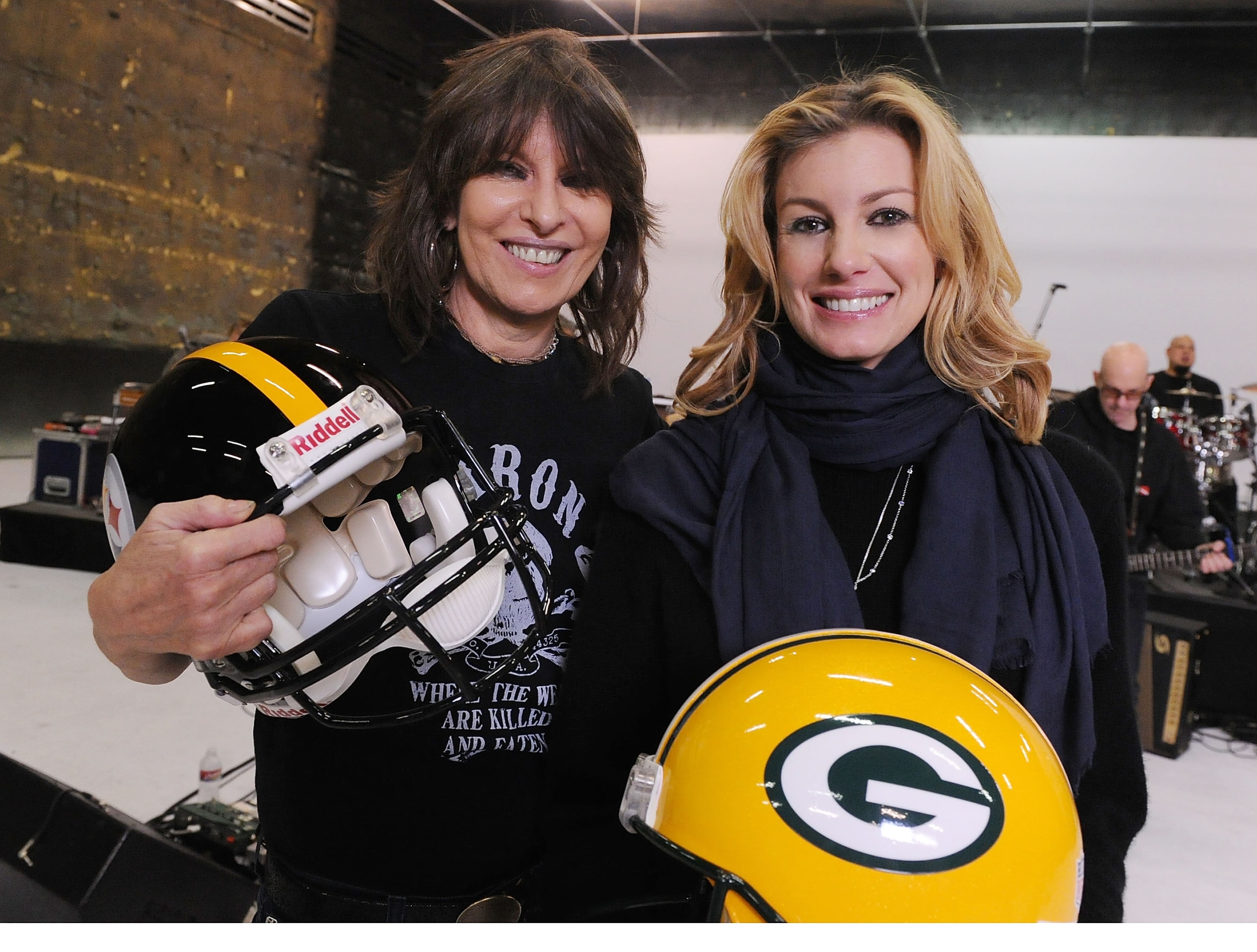 GRAND PRAIRIE, TX - FEBRUARY 04: Faith Hill and Chrissie Hynde pose during rehearsals for the CMT Crossroads Live From 'Pepsi Super Bowl Fan Jam' at Verizon Theater on February 4, 2011 in Grand Prairie, Texas. (Photo by Rick Diamond/Getty Images for CMT GRAND PRAIRIE, TX - FEBRUARY 04: Faith Hill and Chrissie Hynde pose during rehearsals for the CMT Crossroads Live From 'Pepsi Super Bowl Fan Jam' at Verizon Theater on February 4, 2011 in Grand Prairie, Texas. (Photo by Rick Diamond/Getty Images for CMT