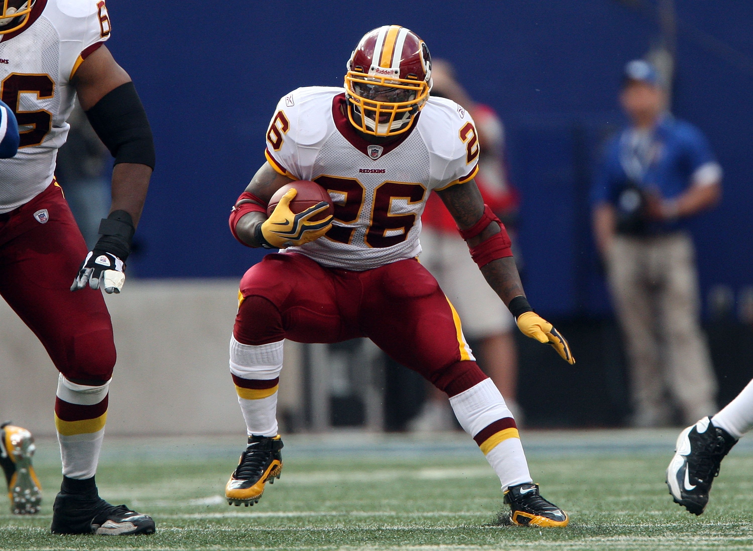 Washington Redskins Clinton Portis (26) runs for 9 yards in the second  quarter at Giants Stadium in East Rutherford, New Jersey on November 4,  2007. The Washington Redskins defeated the New York