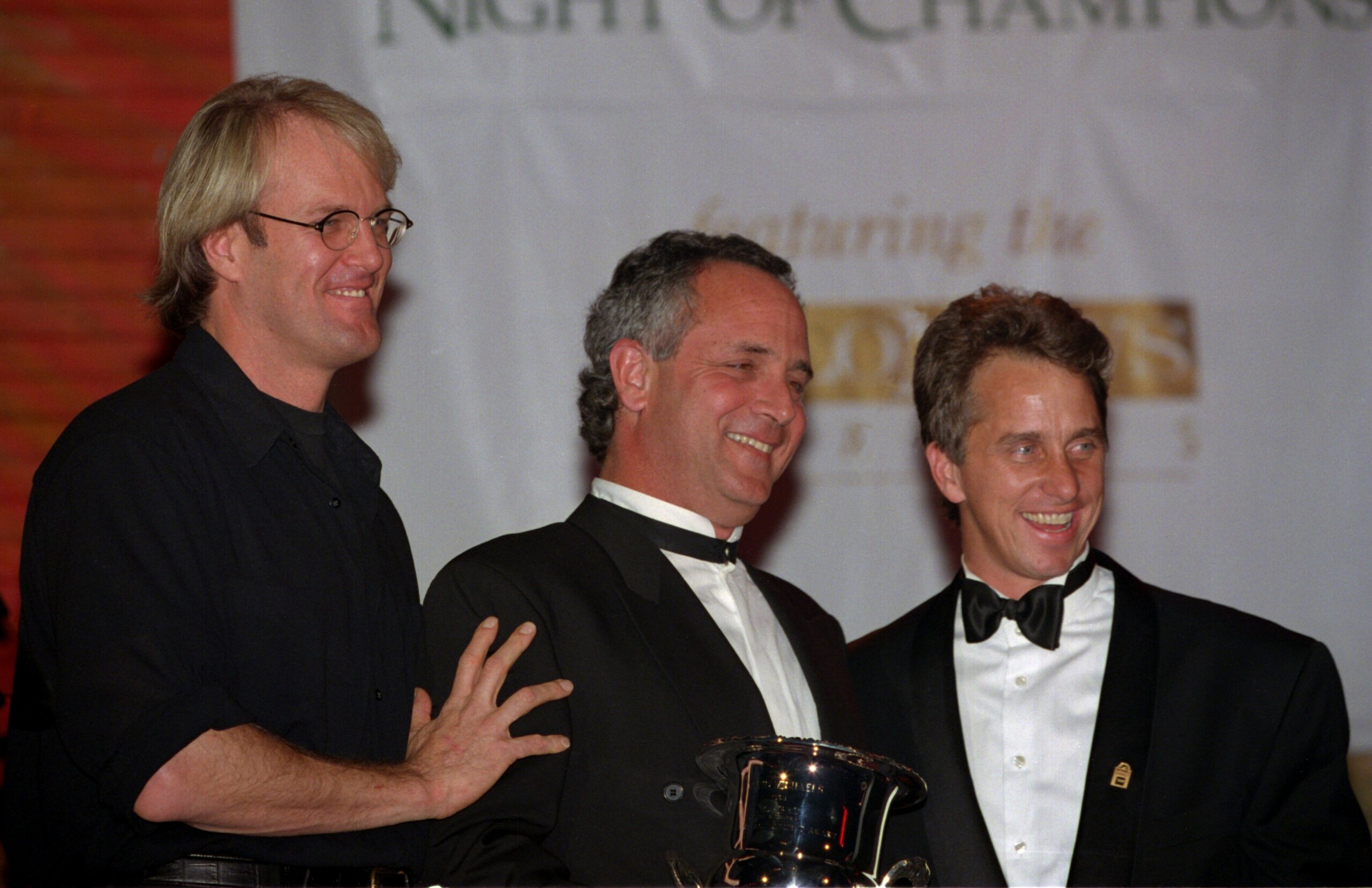 3 Dec 1995: ENTERTAINMENT TONIGHT HOST JOHN TESH, LEFT, AND THREE TIMES TOUR DE FRANCE WIINER GREG LEMOND, RIGHT, PRESENT THE KORBEL LIFETIME ACHIEVEMENT AWARD TO DAVID MICHAEL, TV PRODUCER FOR THE CBS SPORTS COVERAGE OF THE TOUR DE FRANCE, FOR HIS CONTRI 3 Dec 1995: ENTERTAINMENT TONIGHT HOST JOHN TESH, LEFT, AND THREE TIMES TOUR DE FRANCE WIINER GREG LEMOND, RIGHT, PRESENT THE KORBEL LIFETIME ACHIEVEMENT AWARD TO DAVID MICHAEL, TV PRODUCER FOR THE CBS SPORTS COVERAGE OF THE TOUR DE FRANCE, FOR HIS CONTRI