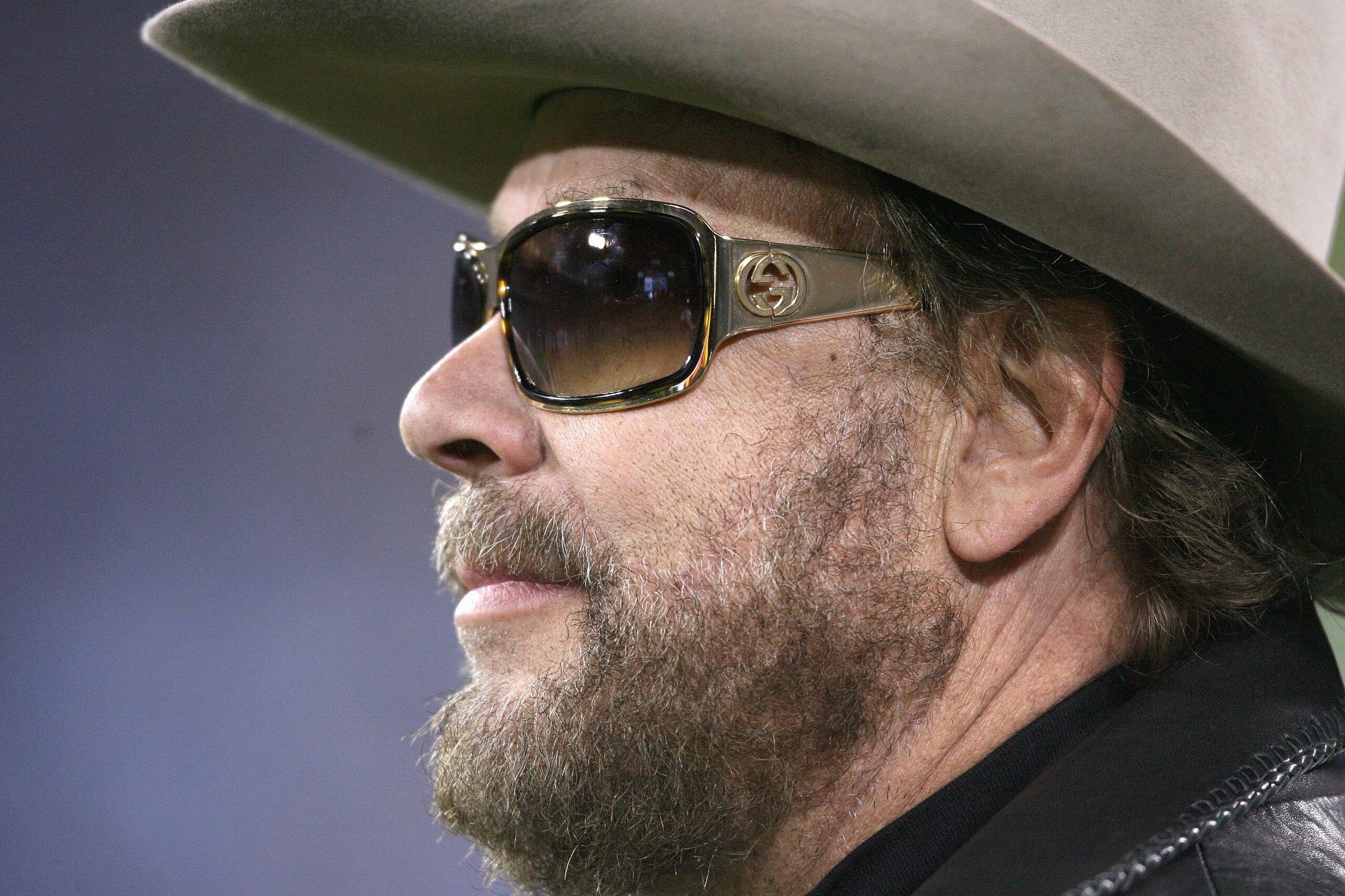 NASHVILLE, TN - OCTOBER 27: Hank Williams Jr. gets ready to sing the National Anthem prior to the game between the Indianapolis Colts against the Tennessee Titans at LP Field on October 27, 2008 in Nashville, Tennessee. The Titans defeated the Colts 31-21 NASHVILLE, TN - OCTOBER 27: Hank Williams Jr. gets ready to sing the National Anthem prior to the game between the Indianapolis Colts against the Tennessee Titans at LP Field on October 27, 2008 in Nashville, Tennessee. The Titans defeated the Colts 31-21
