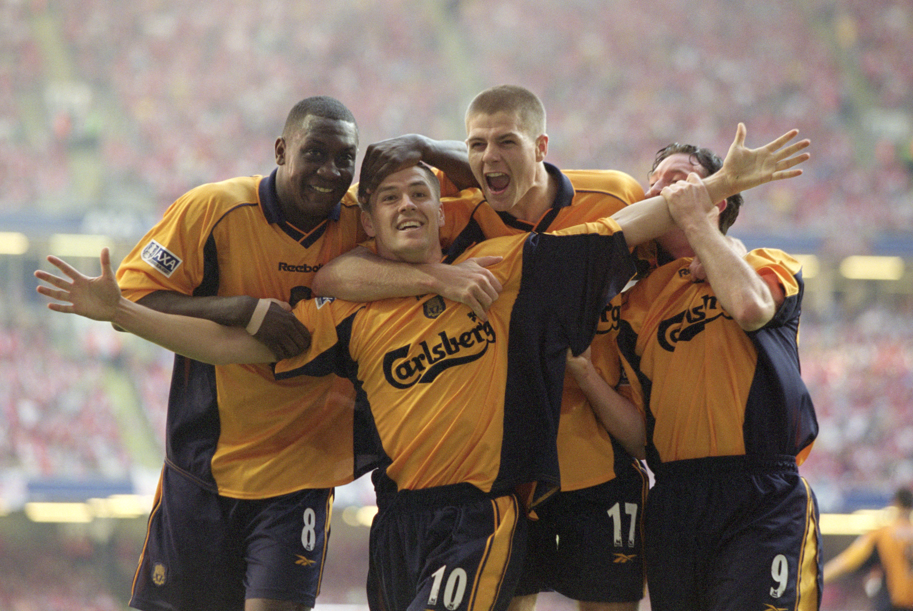 12 May 2001:  Michael Owen of Liverpool celebrates his equaliser with team mates Emile Heskey, Steven Gerrard and Robbie Fowler in the AXA Sponsored FA Cup Final against Arsenal at the Millennium Stadium in Cardiff, Wales. Liverpool won 2-1. \ Mandatory C