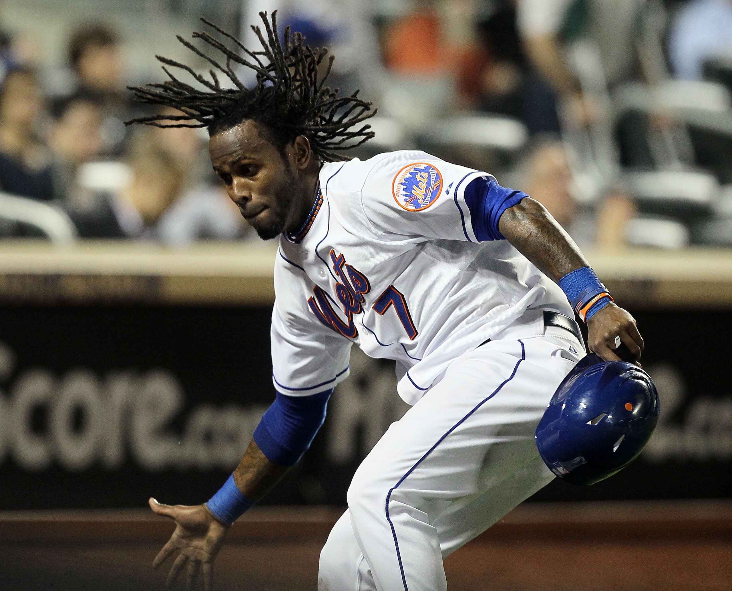 NEW YORK, NY - APRIL 11:  Jose Reyes #7 of the New York Mets celebrates after scoring a run in the third inning against the Colorado Rockies on April 11, 2011 at Citi Field in the Flushing neighborhood of the Queens borough of New York City.  (Photo by Ji