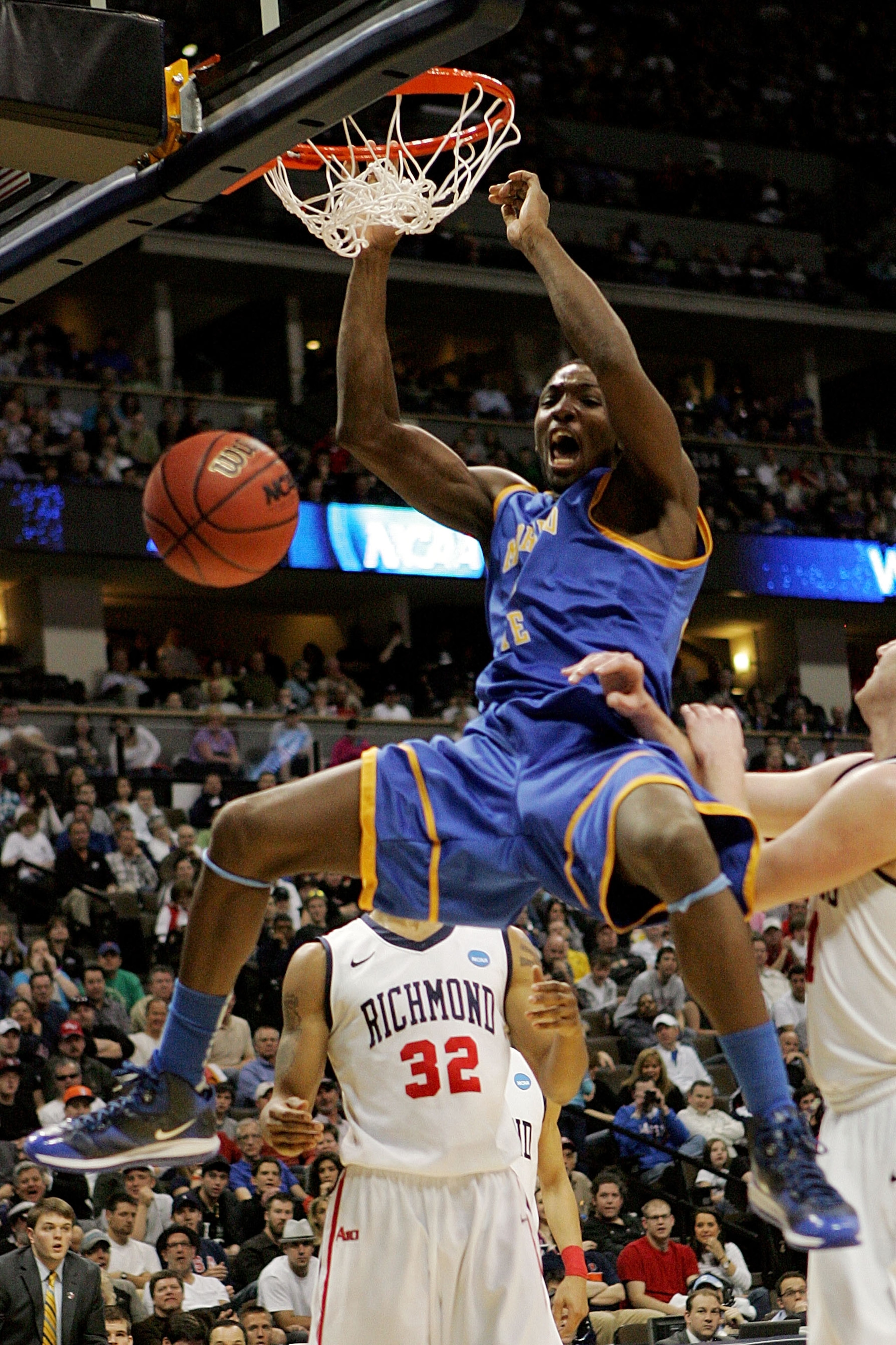 DENVER, CO - MARCH 19: Kenneth Faried #35 of the Morehead State Eagles dunks the ball against the Richmond Spiders during the third round of the 2011 NCAA men's basketball tournament at Pepsi Center on March 19, 2011 in Denver, Colorado. (Photo by Justi DENVER, CO - MARCH 19: Kenneth Faried #35 of the Morehead State Eagles dunks the ball against the Richmond Spiders during the third round of the 2011 NCAA men's basketball tournament at Pepsi Center on March 19, 2011 in Denver, Colorado. (Photo by Justi