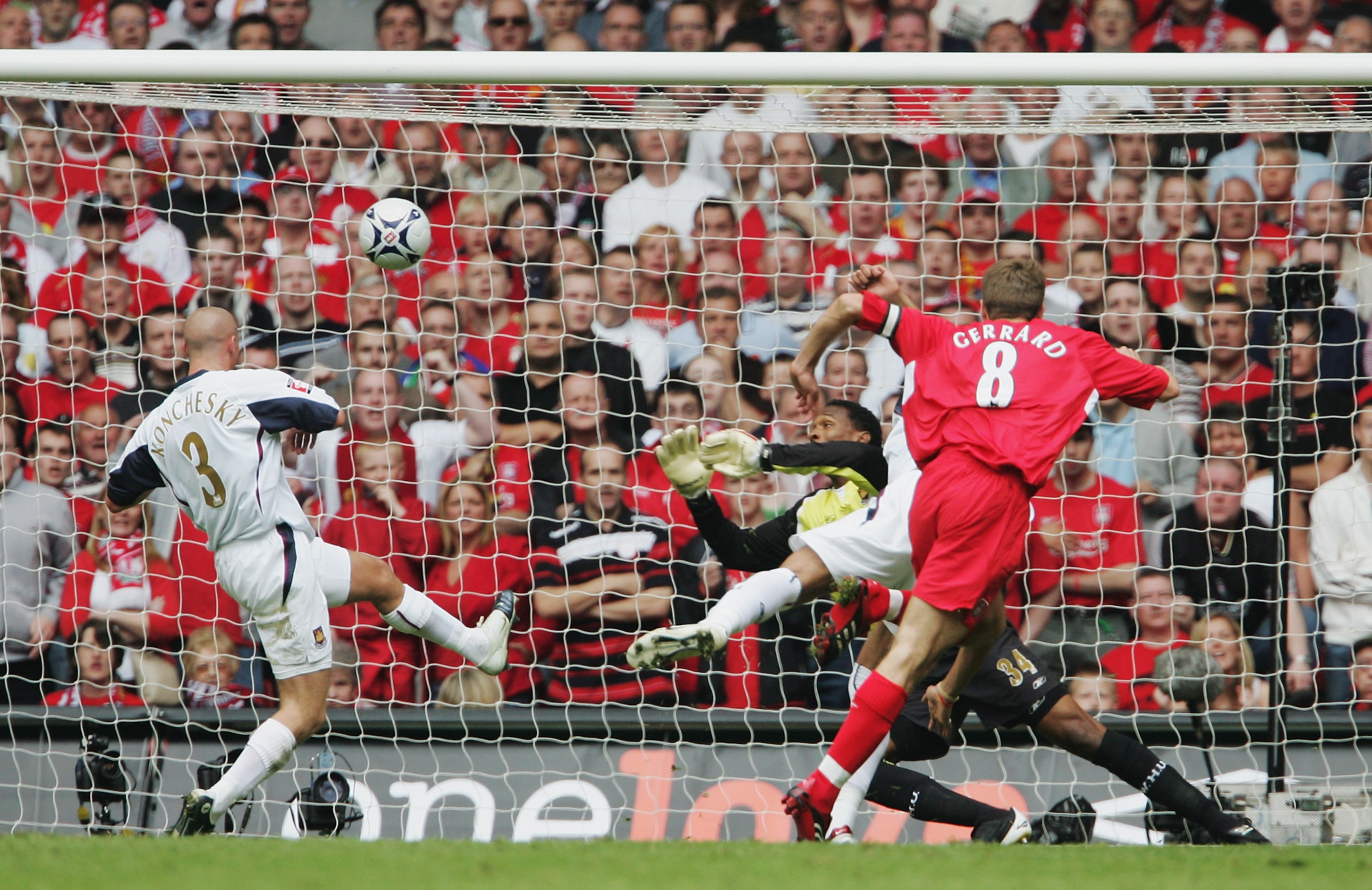 CARDIFF, UNITED KINGDOM - MAY 13:  Steven Gerrard of Liverpool shoots and scores his sides first goal during the FA Cup Final match between Liverpool and West Ham United at the Millennium Stadium on May 13, 2006 in Cardiff, Wales.  (Photo by Phil Cole/Get