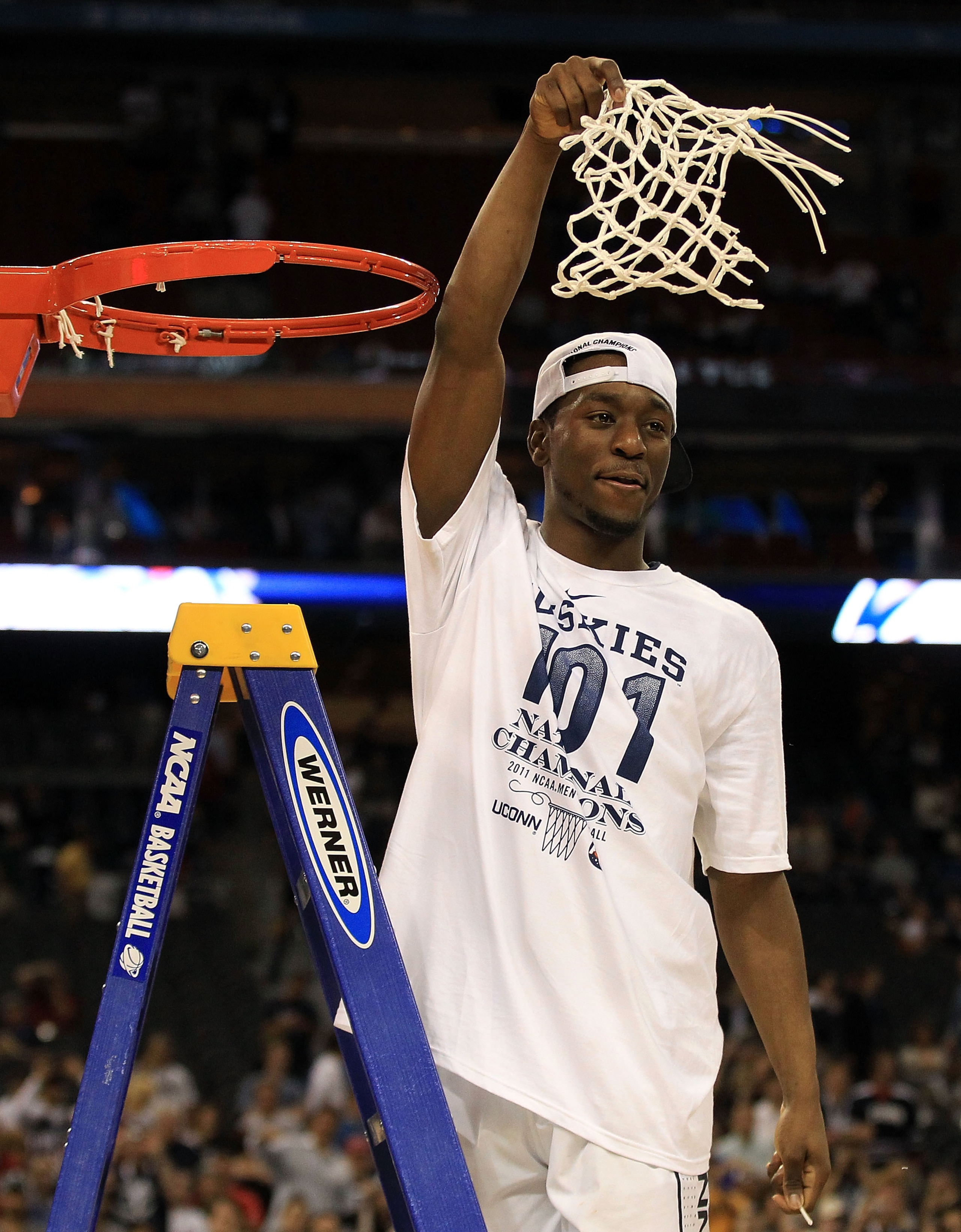 HOUSTON, TX - APRIL 04: Kemba Walker #15 of the Connecticut Huskies cuts down the net after defeating the Butler Bulldogs to win the National Championship Game of the 2011 NCAA Division I Men's Basketball Tournament by a score of 53-41 at Reliant Stadium HOUSTON, TX - APRIL 04: Kemba Walker #15 of the Connecticut Huskies cuts down the net after defeating the Butler Bulldogs to win the National Championship Game of the 2011 NCAA Division I Men's Basketball Tournament by a score of 53-41 at Reliant Stadium