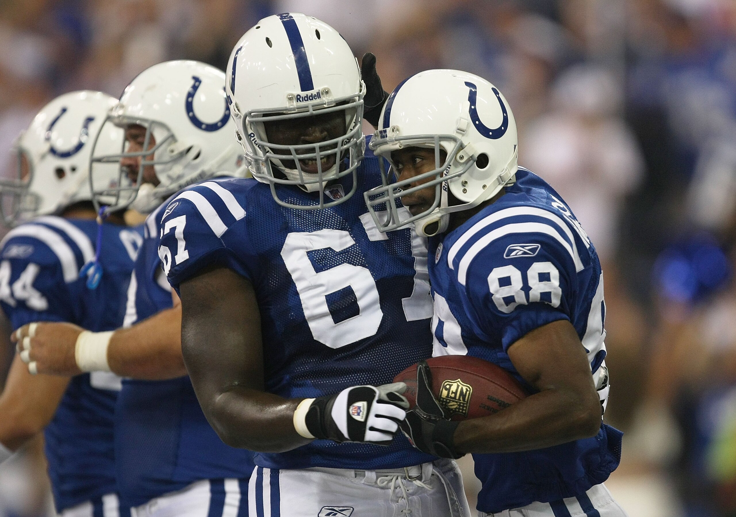 INDIANAPOLIS - SEPTEMBER 06: Marvin Harrison #88 of the Indianapolis Colts is congratulated by teammate Tony Ugoh #67 on his first quarter touchdown reception against the New Orleans Saints in the first NFL game of the season at the RCA Dome on September INDIANAPOLIS - SEPTEMBER 06: Marvin Harrison #88 of the Indianapolis Colts is congratulated by teammate Tony Ugoh #67 on his first quarter touchdown reception against the New Orleans Saints in the first NFL game of the season at the RCA Dome on September