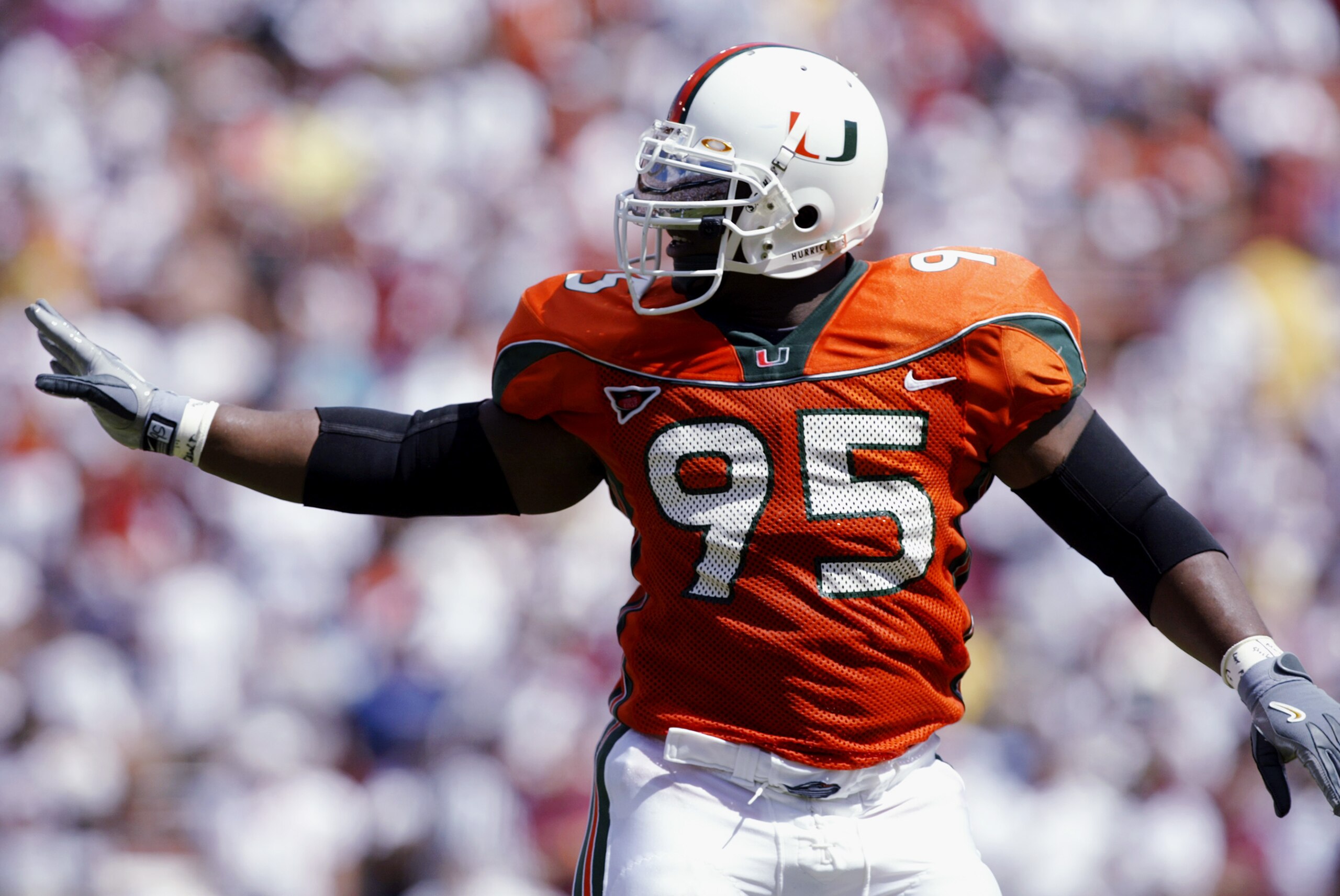 MIAMI - OCTOBER 12: Defensive end Jerome McDougle #95 of Miami looks on against Florida State during the game on October 12, 2002 at the Orange Bowl in Miami, Florida. Miami edged Florida State 28-27. (Photo by Andy Lyons/Getty Images) MIAMI - OCTOBER 12: Defensive end Jerome McDougle #95 of Miami looks on against Florida State during the game on October 12, 2002 at the Orange Bowl in Miami, Florida. Miami edged Florida State 28-27. (Photo by Andy Lyons/Getty Images)