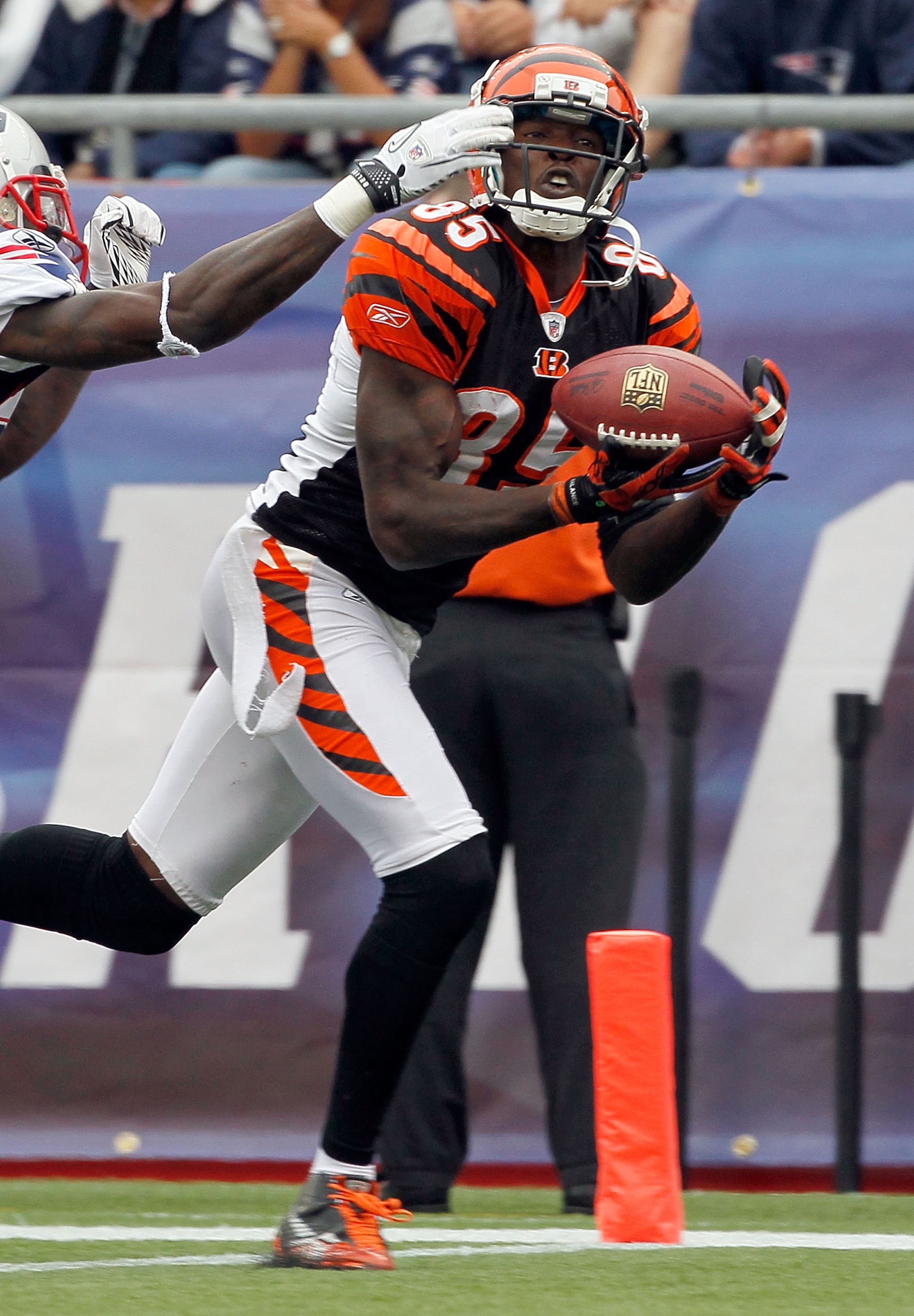FOXBORO, MA - SEPTEMBER 12:  Darius Butler #28 of the New England Patriots cannot stop a touchdown catch by Chad Ochocinco #85 of the Cincinnati Bengals in the second half during the NFL season opener  at Gillette Stadium on September 12, 2010 in Foxboro,