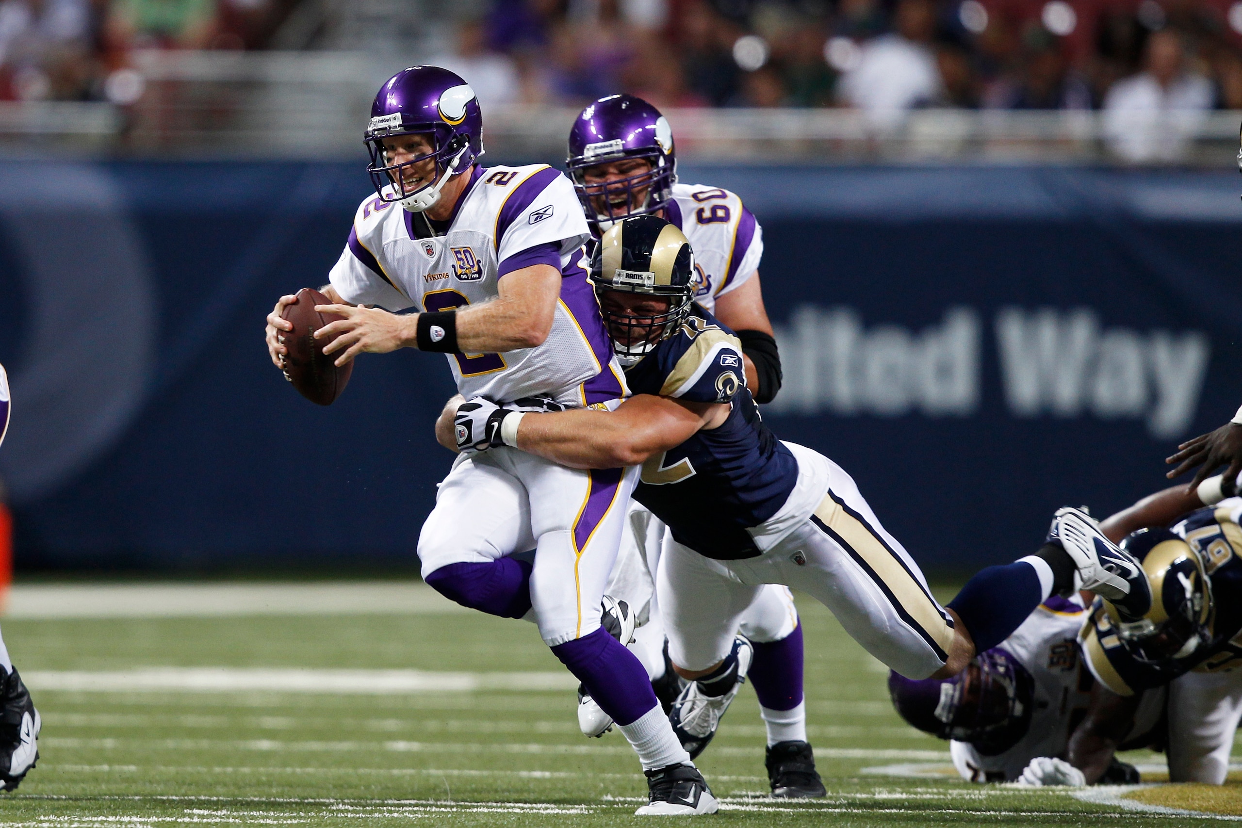 ST. LOUIS, MO - AUGUST 14: Sage Rosenfels #2 of the Minnesota Vikings gets sacked by Chris Long #72 of the St. Louis Rams during the preseason game at Edward Jones Dome on August 14, 2010 in St. Louis, Missouri. (Photo by Joe Robbins/Getty Images) ST. LOUIS, MO - AUGUST 14: Sage Rosenfels #2 of the Minnesota Vikings gets sacked by Chris Long #72 of the St. Louis Rams during the preseason game at Edward Jones Dome on August 14, 2010 in St. Louis, Missouri. (Photo by Joe Robbins/Getty Images)