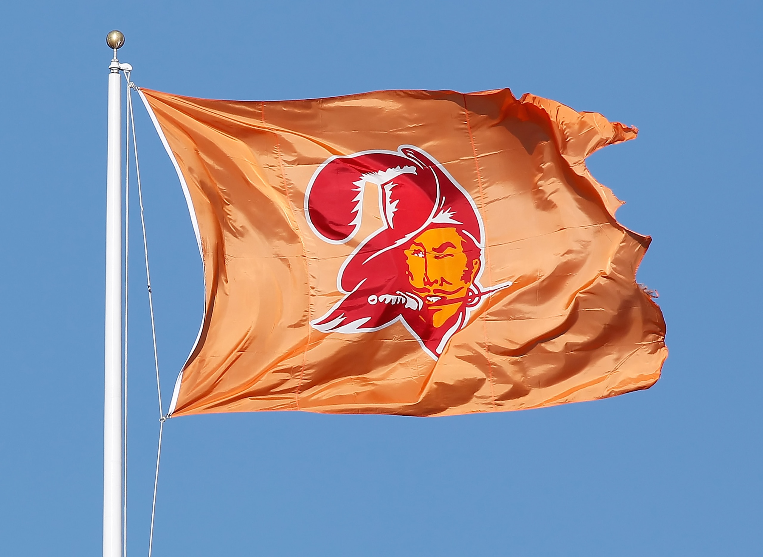TAMPA, FL - DECEMBER 05:  A 'throwback Bucco Bruce Flag' of the Tampa Bay Buccaneers flies over Raymond James Stadium just before the start of the game against the Atlanta Falcons on December 5, 2010 in Tampa, Florida.  (Photo by J. Meric/Getty Images)