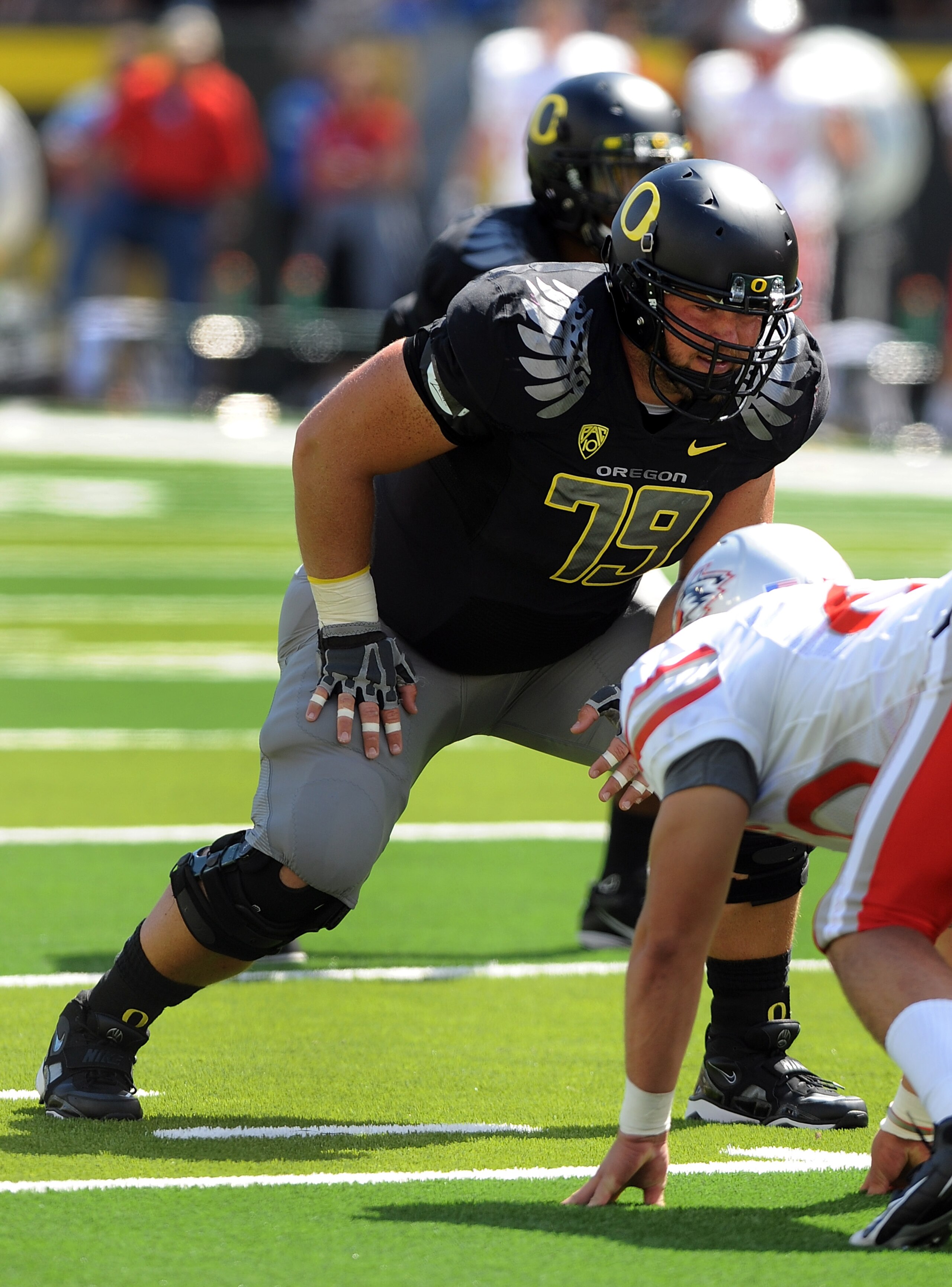 EUGENE, OR - SEPTEMBER 04:  Offensive lineman Mark Asper #79 of the Oregon Ducks gets set at the line of scrimmage in the second quarter of the game against the New Mexico Lobos at Autzen Stadium on September 4, 2010 in Eugene, Oregon. Oregon won the game