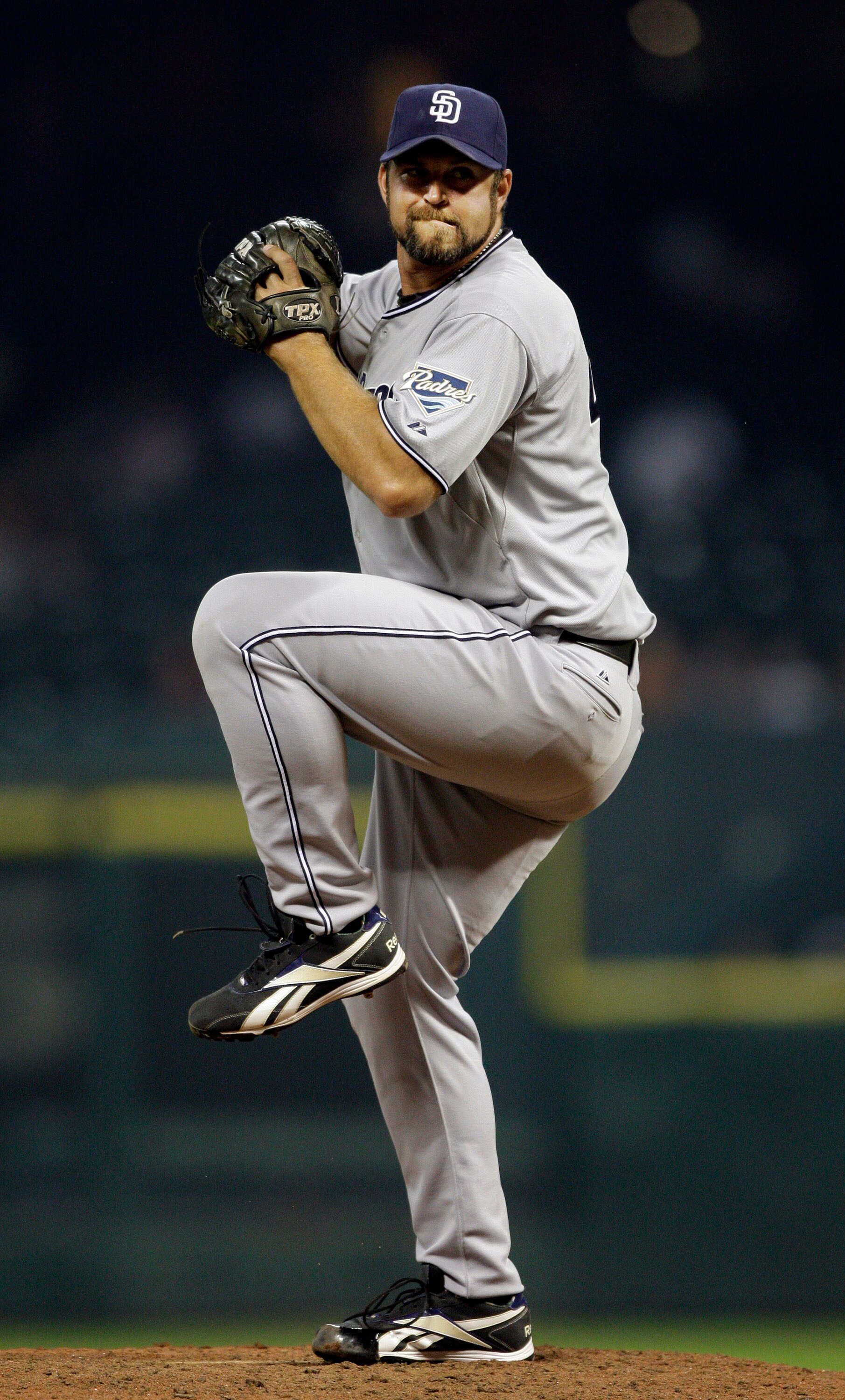 HOUSTON - APRIL 15:  Pitcher Heath Bell #21 of the San Diego Padres throws in the ninth inning against the Houston Astros at Minute Maid Park on April 15, 2011 in Houston, Texas.  (Photo by Bob Levey/Getty Images)