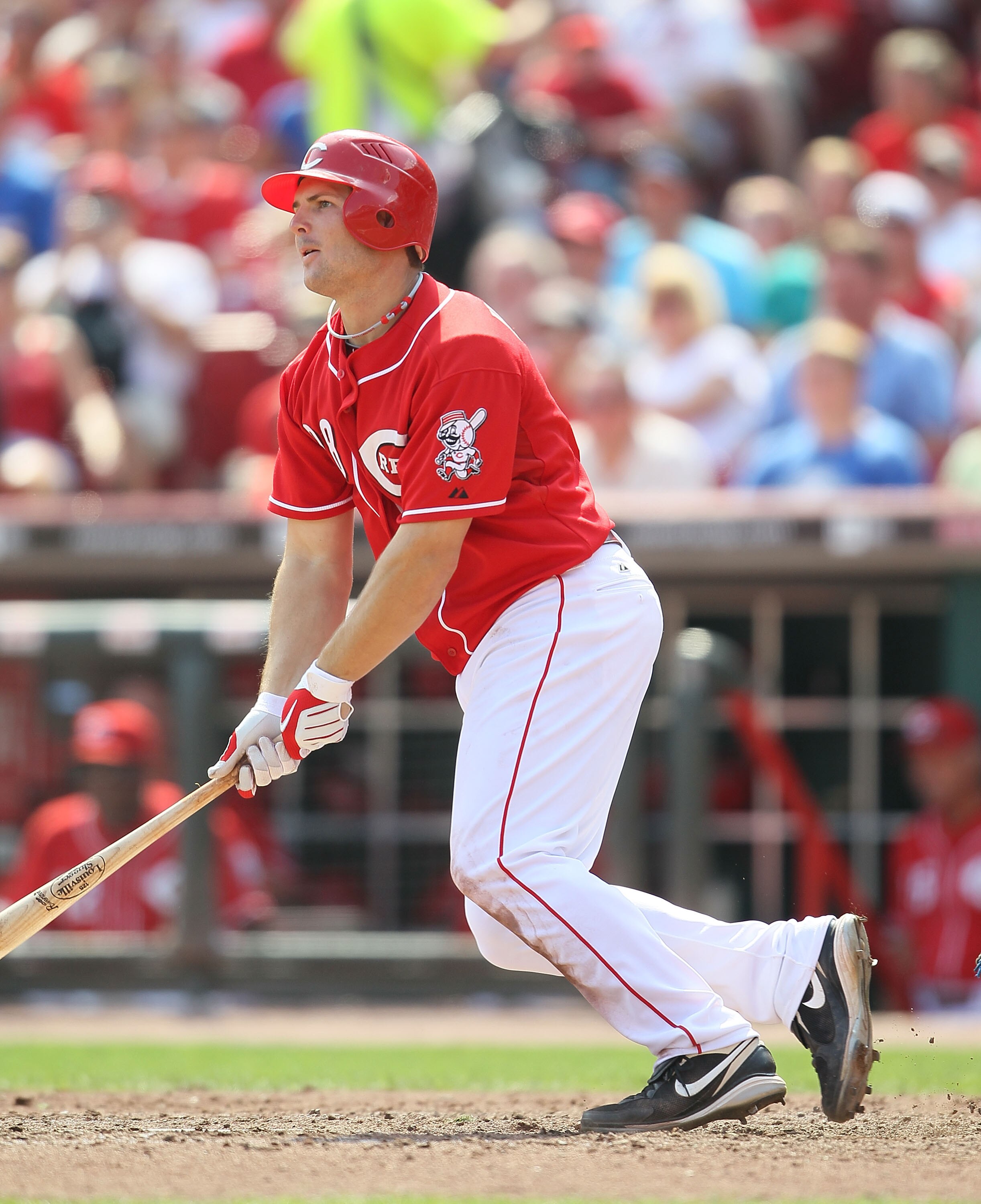 CINCINNATI - AUGUST 29:  Chris Heisey #28 of the Cincinnati Reds hits a single during the game against the Chicago Cubs at Great American Ball Park on August 29, 2010 in Cincinnati, Ohio.  (Photo by Andy Lyons/Getty Images)