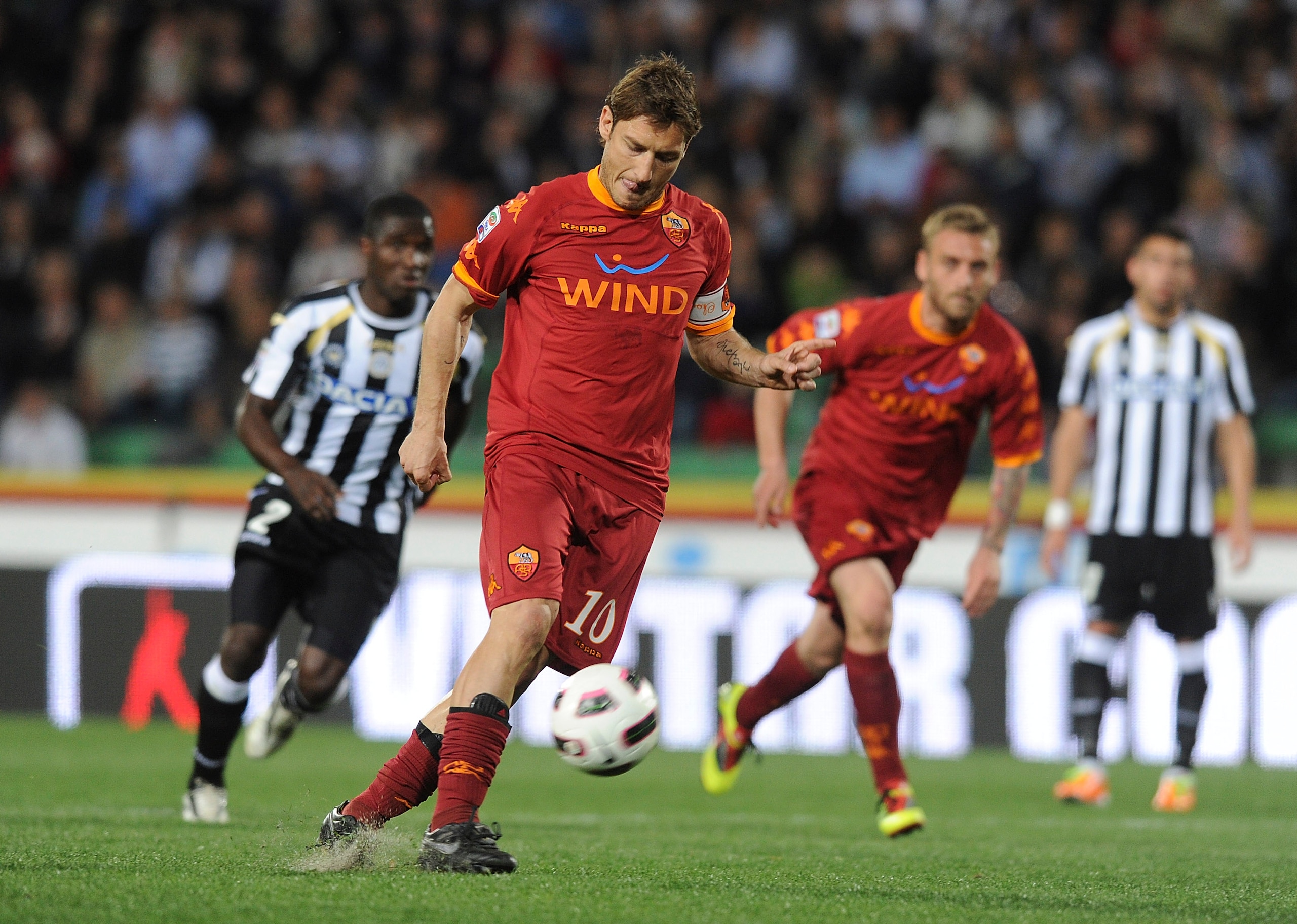 UDINE, ITALY - APRIL 09:  Francesco Totti of Roma scores his opening penalty goal  during the Serie A match between Udinese Calcio and AS Roma at Stadio Friuli on April 9, 2011 in Udine, Italy.  (Photo by Dino Panato/Getty Images)