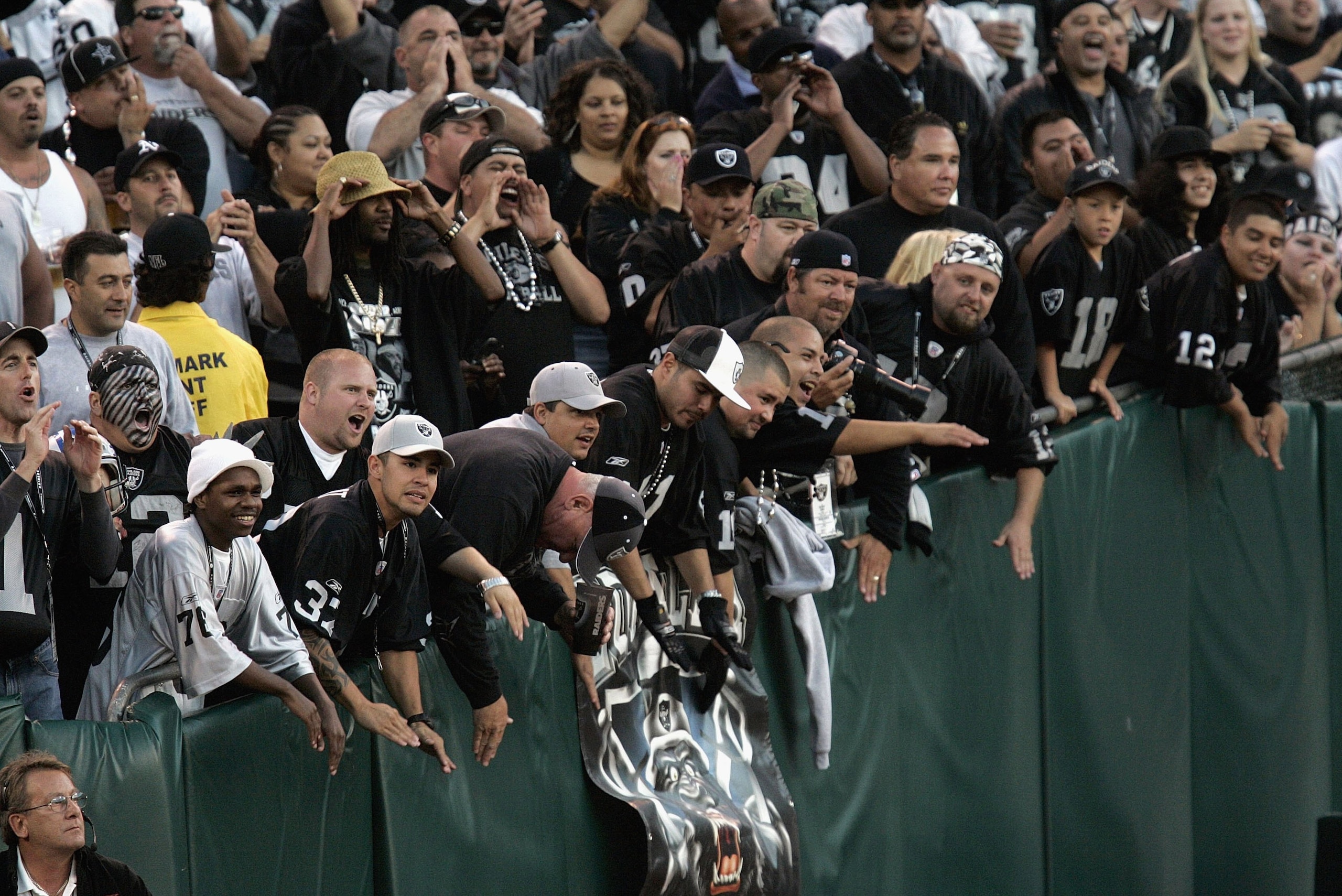 OAKLAND, CA - AUGUST 25: The Raider Nation in the famous black hole cheer on their Oakland Raiders as the Oakland Raiders host the Detroit Lions at McAfee Stadium on August 25, 2006 in Oakland, California. (Photo by David Paul Morris /Getty Images) OAKLAND, CA - AUGUST 25: The Raider Nation in the famous black hole cheer on their Oakland Raiders as the Oakland Raiders host the Detroit Lions at McAfee Stadium on August 25, 2006 in Oakland, California. (Photo by David Paul Morris /Getty Images)