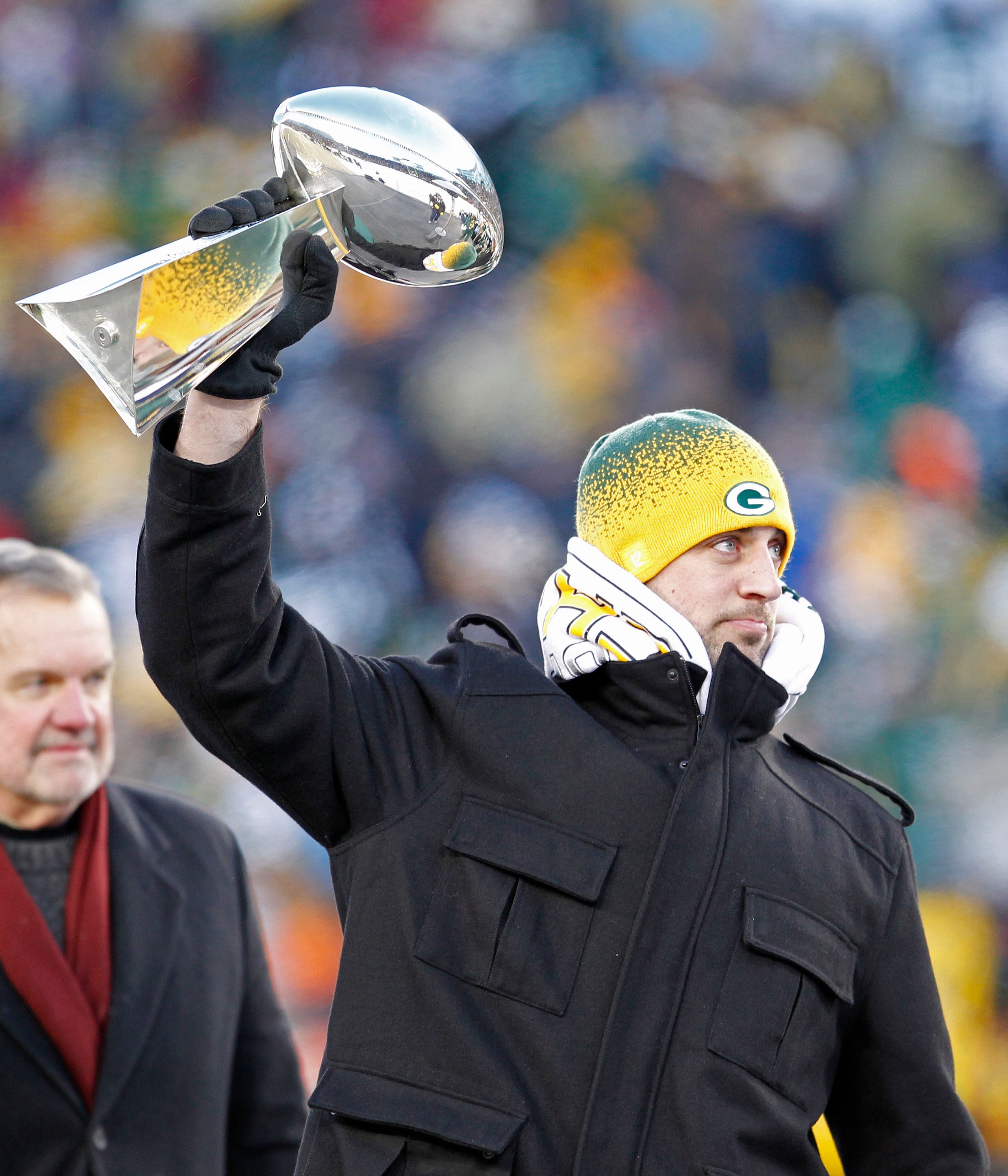 GREEN BAY, WI - FEBRUARY 08: Green Bay Packers quarterback Aaron Rodgers hoists the Lombardi Trophy during the Packers victory ceremony at Lambeau Field on February 8, 2011 in Green Bay, Wisconsin. (Photo by Matt Ludtke/Getty Images) GREEN BAY, WI - FEBRUARY 08: Green Bay Packers quarterback Aaron Rodgers hoists the Lombardi Trophy during the Packers victory ceremony at Lambeau Field on February 8, 2011 in Green Bay, Wisconsin. (Photo by Matt Ludtke/Getty Images)