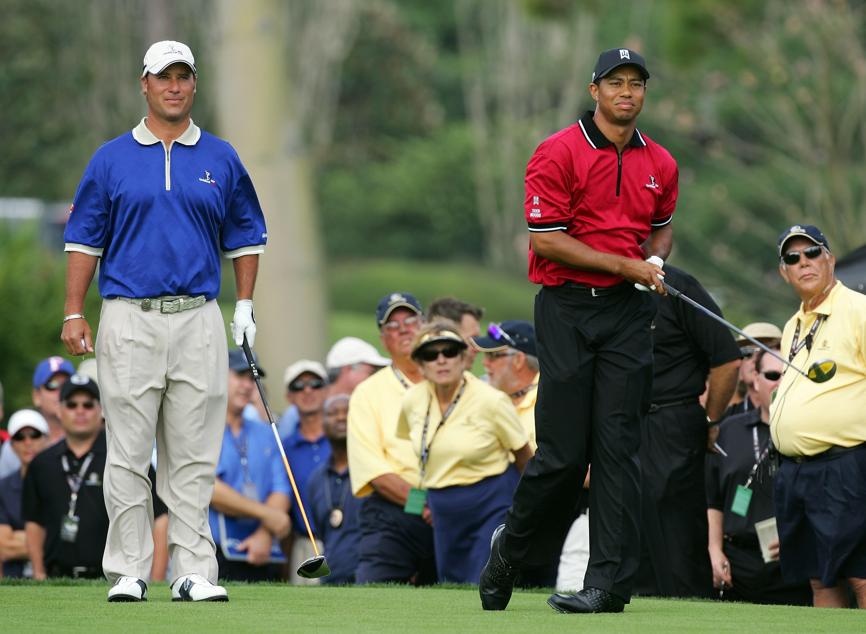 ORLANDO, FL - MARCH 26:  Tiger Woods of the USA and the Isleworth team hits his tee shot at the par 4, 1st hole watched by his opponent Chris DiMarco of the USA and the Lake Nona Team during the first day of the 2007 Tavistock Cup held at the Lake Nona Go