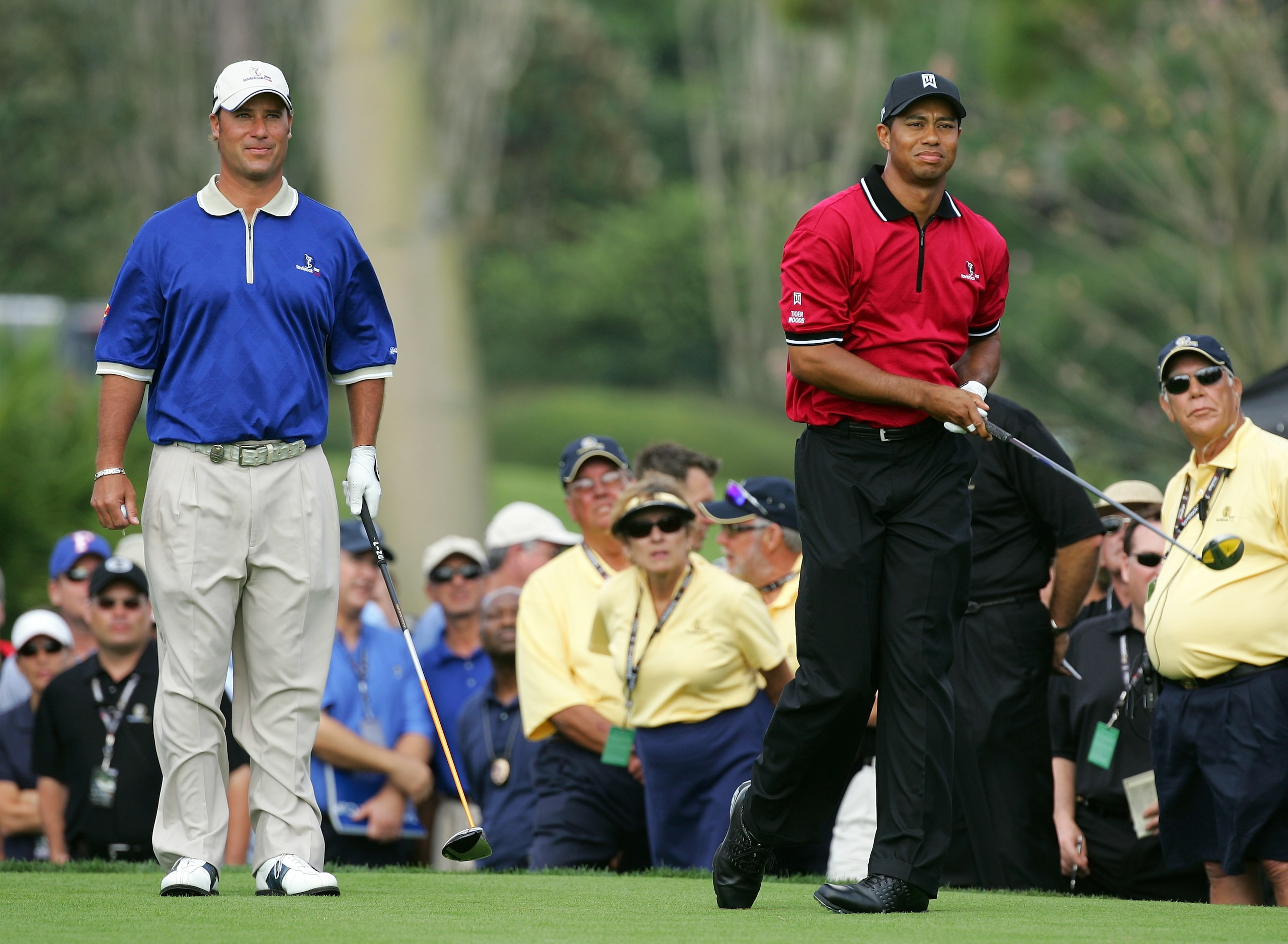 ORLANDO, FL - MARCH 26:  Tiger Woods of the USA and the Isleworth team hits his tee shot at the par 4, 1st hole watched by his opponent Chris DiMarco of the USA and the Lake Nona Team during the first day of the 2007 Tavistock Cup held at the Lake Nona Go
