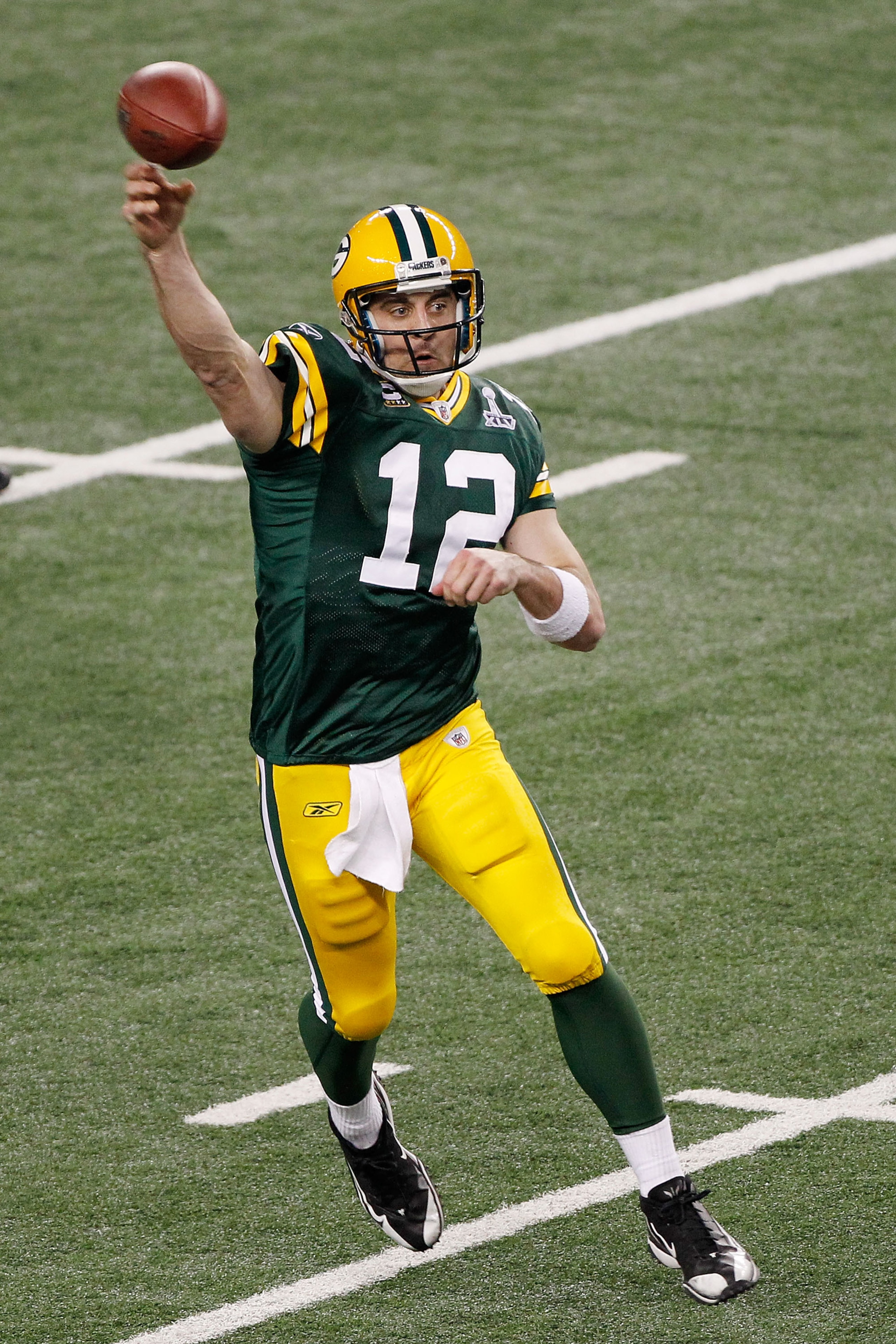 ARLINGTON, TX - FEBRUARY 06:  Aaron Rodgers #12 of the Green Bay Packers throws a pass against the Pittsburgh Steelers during Super Bowl XLV at Cowboys Stadium on February 6, 2011 in Arlington, Texas.  (Photo by Joe Robbins/Getty Images)