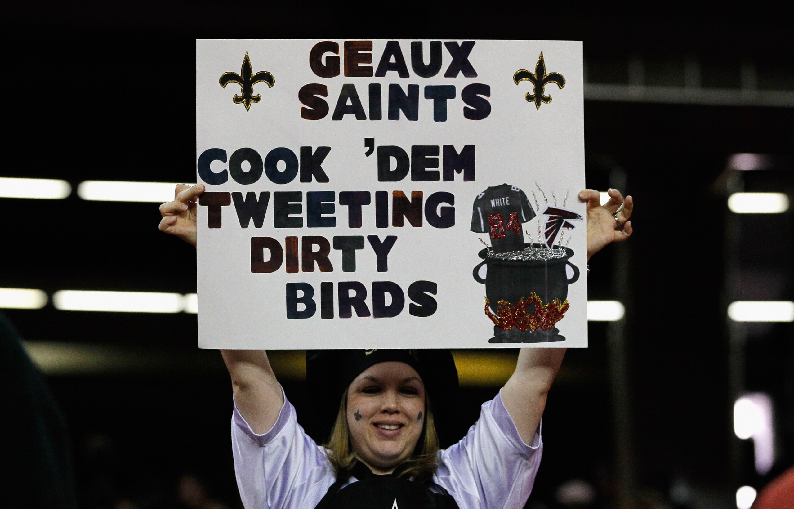 ATLANTA, GA - DECEMBER 27:  A fan of the New Orleans Saints holds up a sign against the Atlanta Falcons at Georgia Dome on December 27, 2010 in Atlanta, Georgia.  (Photo by Kevin C. Cox/Getty Images)