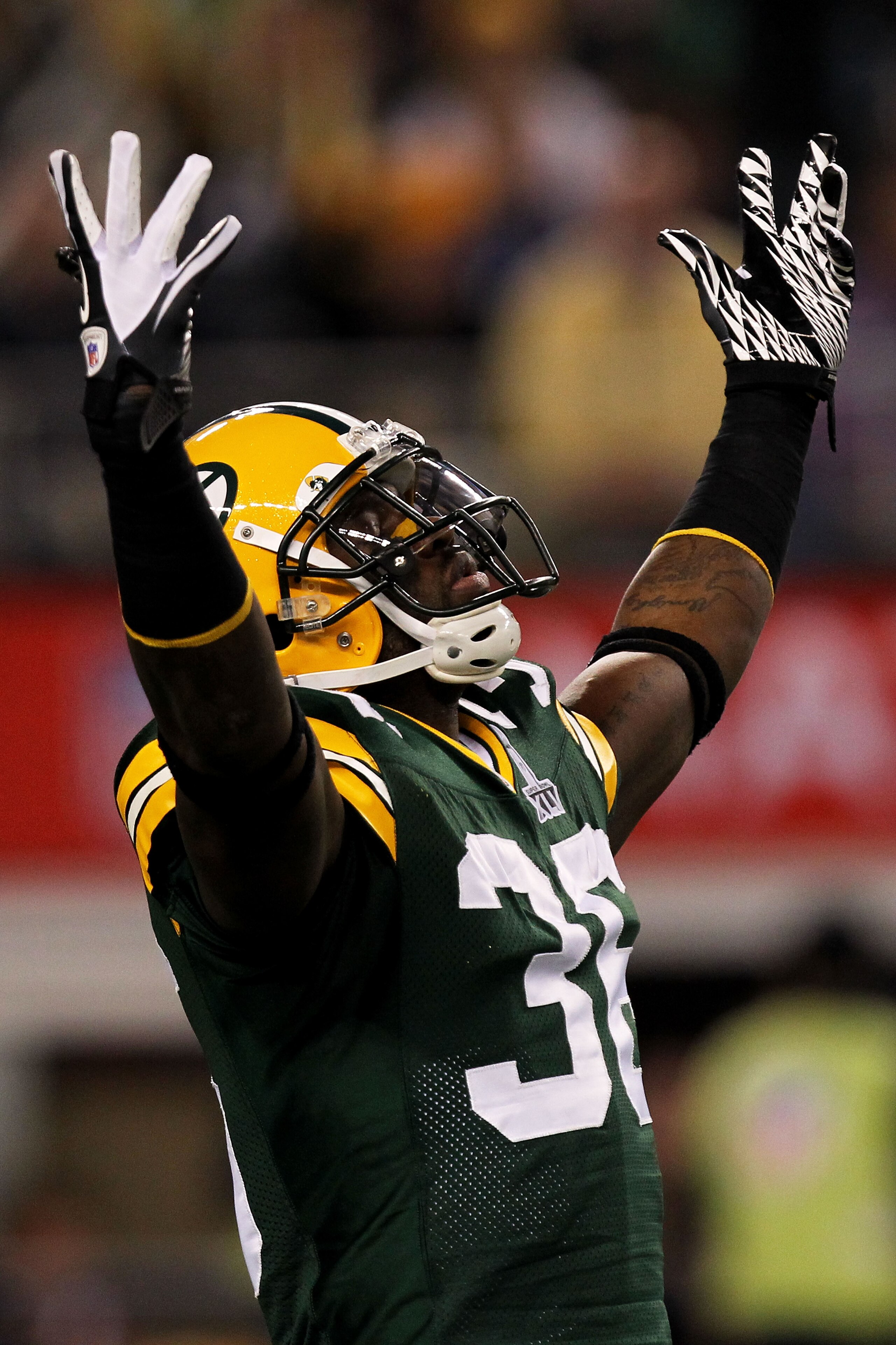 ARLINGTON, TX - FEBRUARY 06:  Tramon Williams #38 of the Green Bay Packers reacts against the Pittsburgh Steelers during Super Bowl XLV at Cowboys Stadium on February 6, 2011 in Arlington, Texas.  (Photo by Ronald Martinez/Getty Images)