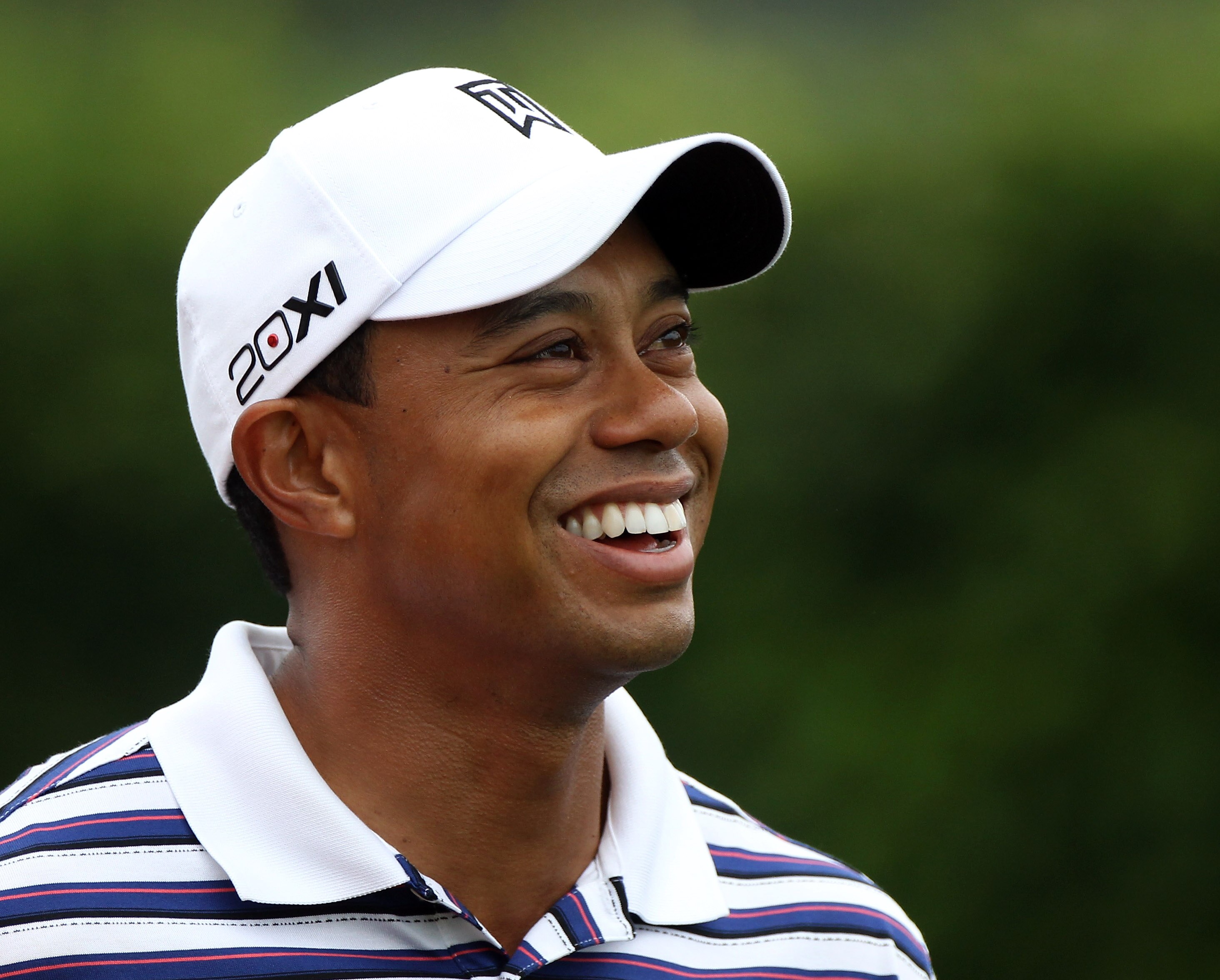 ORLANDO, FL - MARCH 23:  Tiger Woods smiles during the pro-am round prior to the Arnold Palmer Invitational presented by MasterCard at the Bay Hill Club and Lodge on March 23, 2011 in Orlando, Florida.  (Photo by Sam Greenwood/Getty Images)